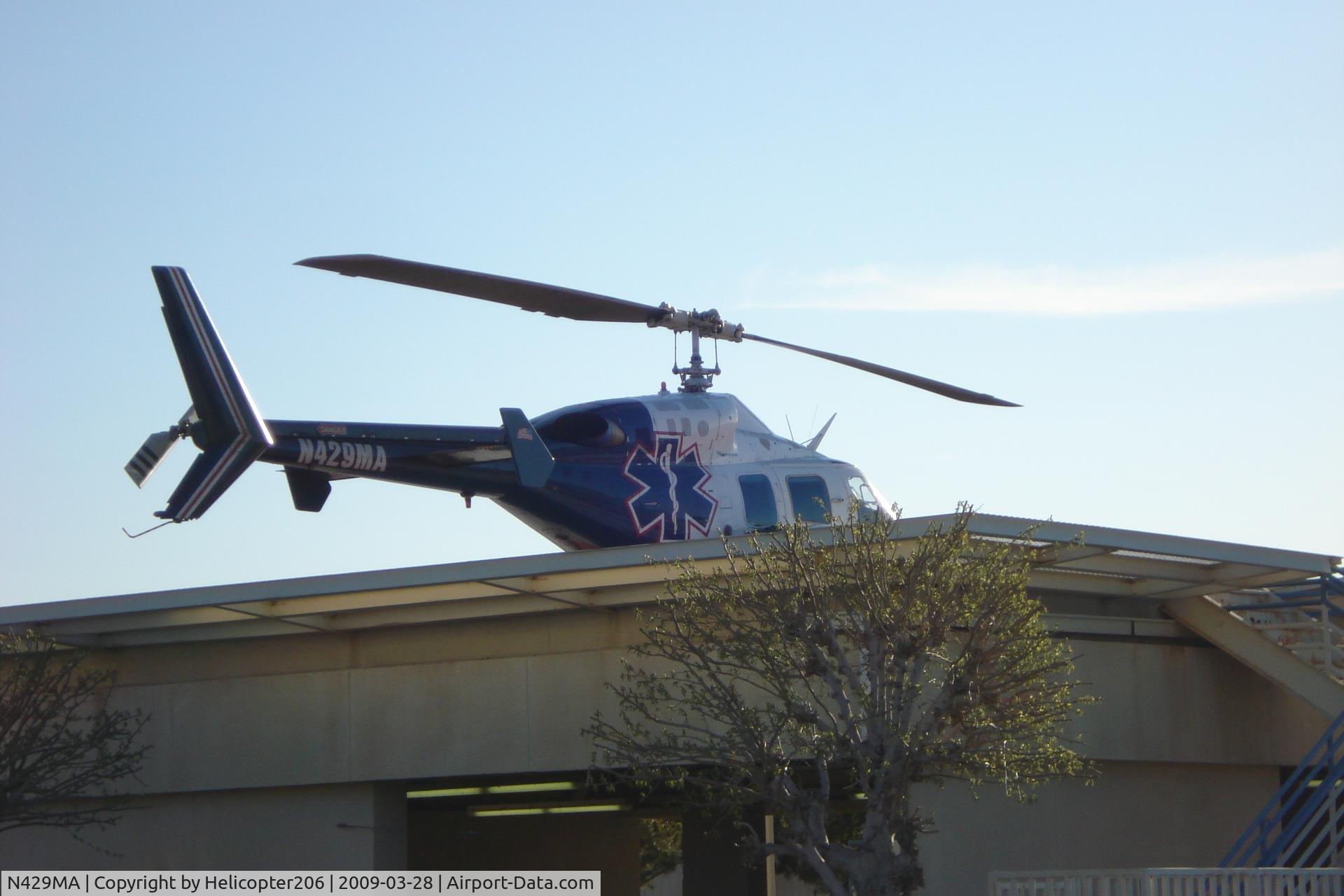 N429MA, 1984 Bell 222UT C/N 47523, N429MA parked at hospital