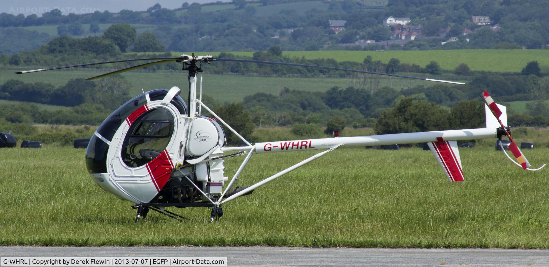 G-WHRL, 1990 Schweizer 269C-300 C/N S-1453, Resident Schweizer 269C Parked up by the Tower.
