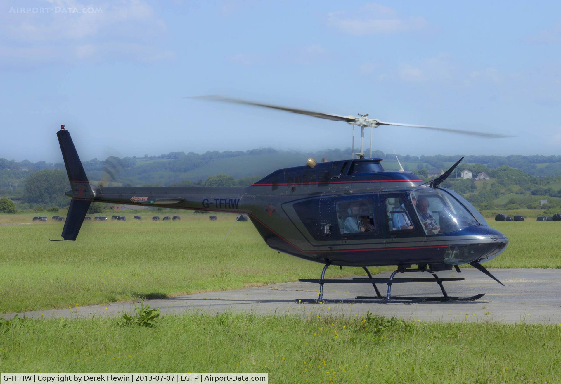 G-TFHW, 1980 Bell 206B JetRanger III C/N 3179, Bell 206B, spooling down on the apron at Pembrey.