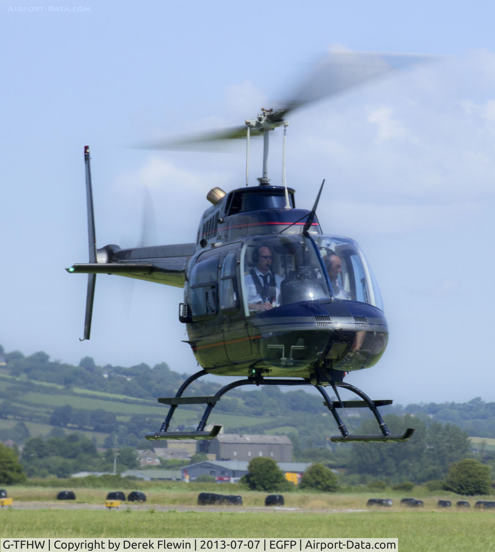 G-TFHW, 1980 Bell 206B JetRanger III C/N 3179, Bell 206B operated by Fly Heli Wales Ltd ready to set down at Pembrey.