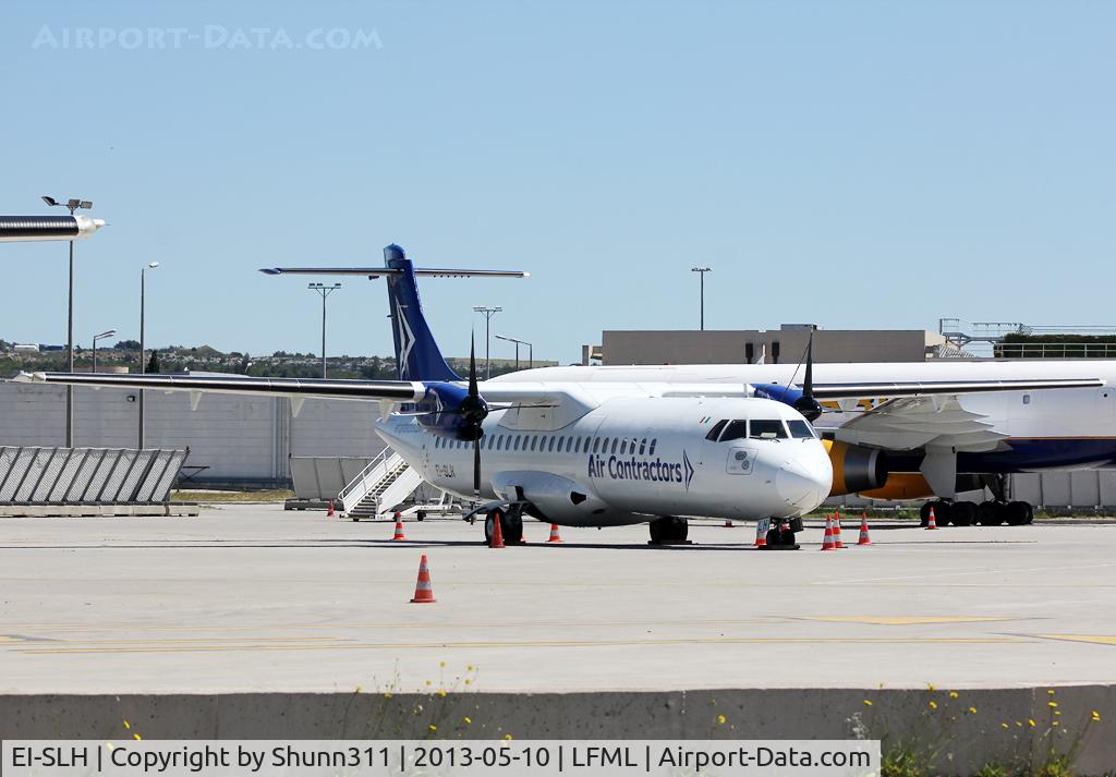 EI-SLH, 1989 ATR 72-215 C/N 157, Parked at the Cargo area...