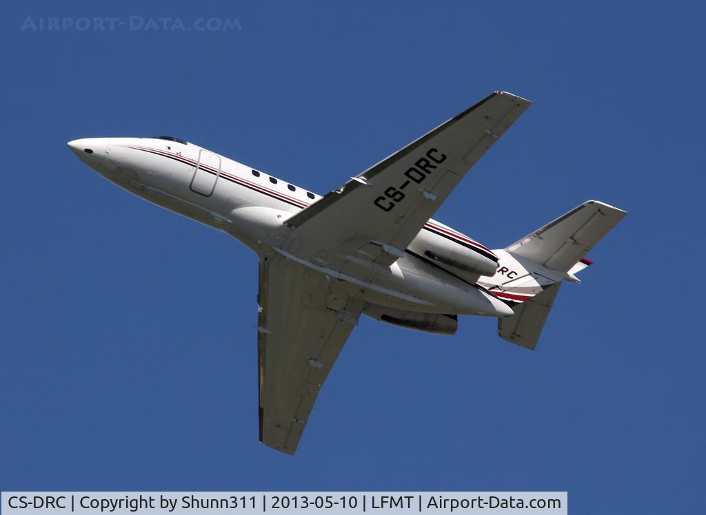 CS-DRC, 2005 Raytheon Hawker 800XP C/N 258714, Climbing after take off...