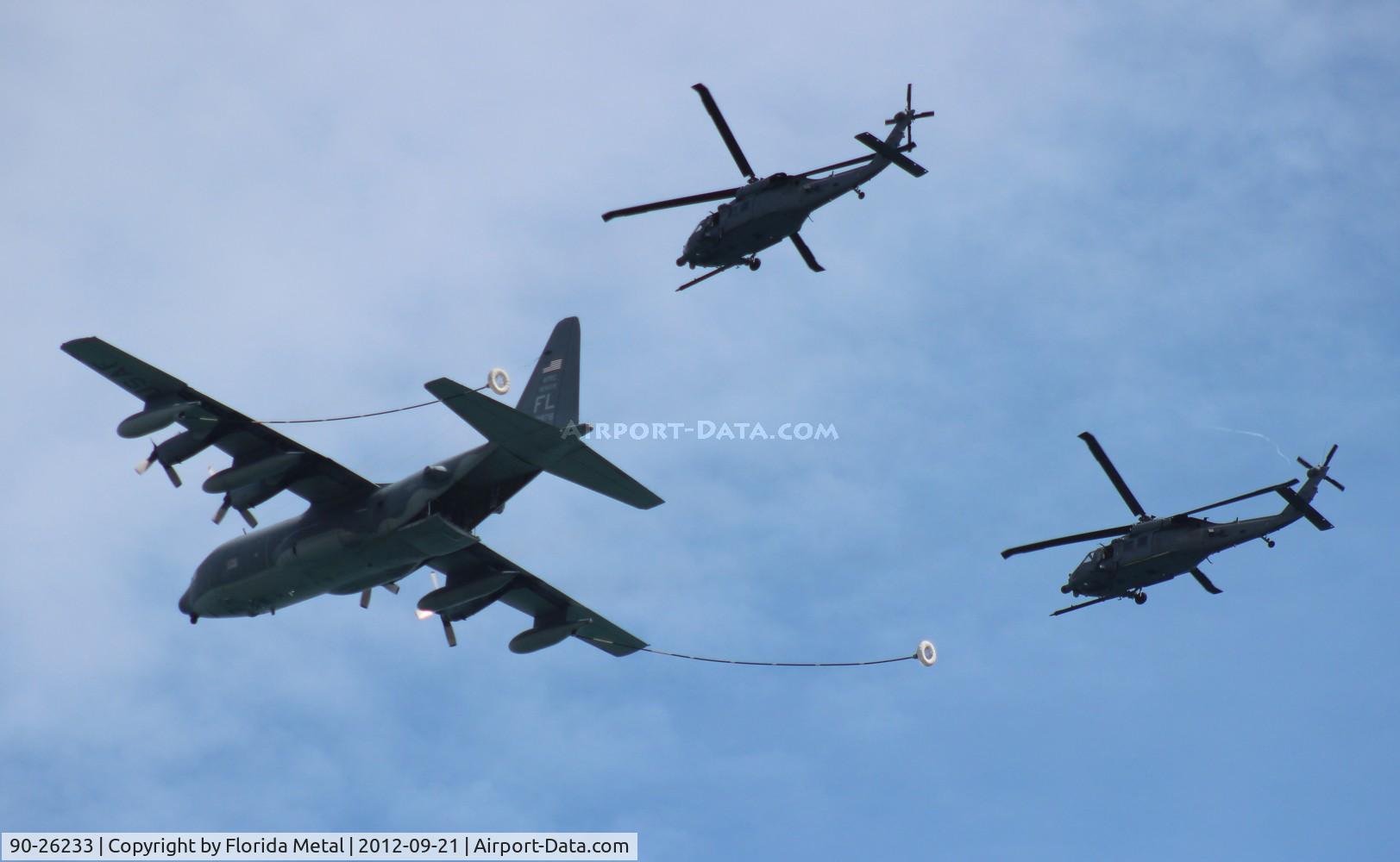 90-26233, Sikorsky HH-60L Black Hawk C/N 701600, HH-60L flying with partner and C-130 over Cocoa Beach