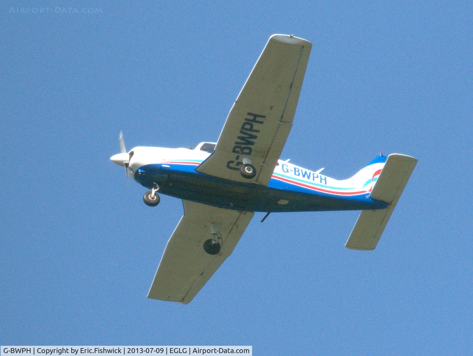 G-BWPH, 1977 Piper PA-28-181 Cherokee Archer II C/N 28-7790311, G-BWPH from Panshanger Airfield overflying Tewin Village.
