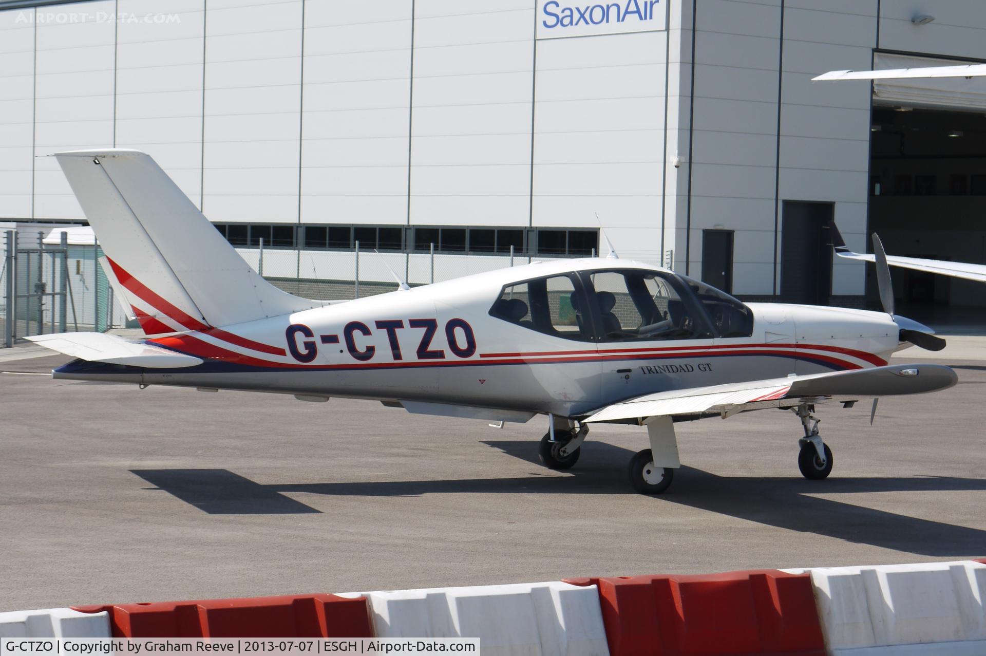 G-CTZO, 2002 Socata TB-20 Trinidad C/N 2166, Parked at Norwich.