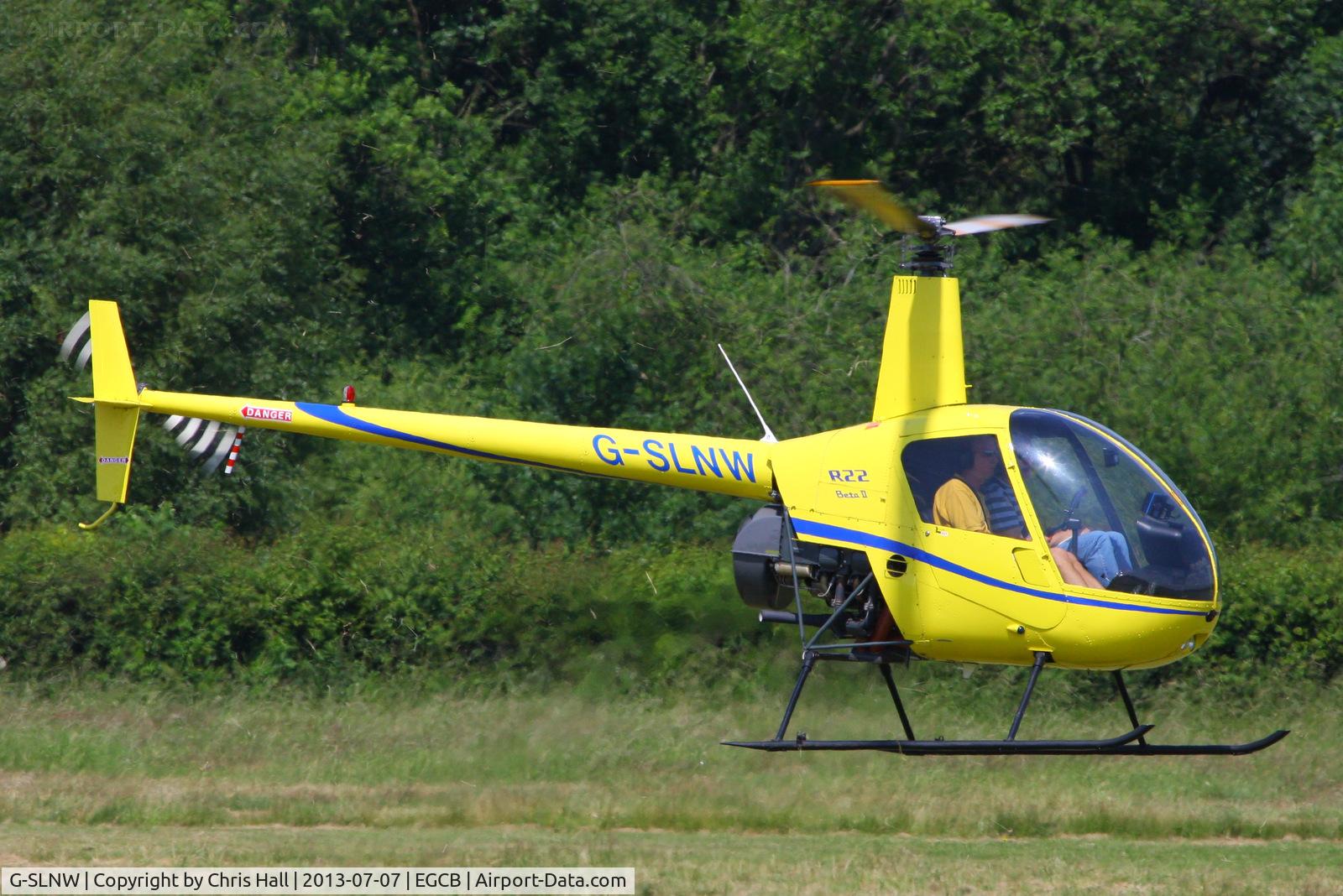G-SLNW, 2003 Robinson R22 Beta II C/N 3524, at the Barton open day and fly in