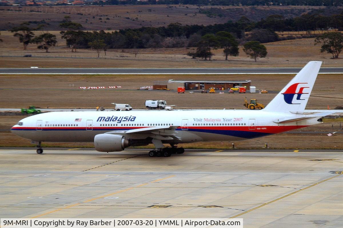 9M-MRI, 1998 Boeing 777-2H6/ER C/N 28416, Boeing 777-2H6ER [28416] (Malaysian Airlines) Melbourne Int~VH 20/03/2007 . Wearing Visit Malaysia Year 2007 titles.