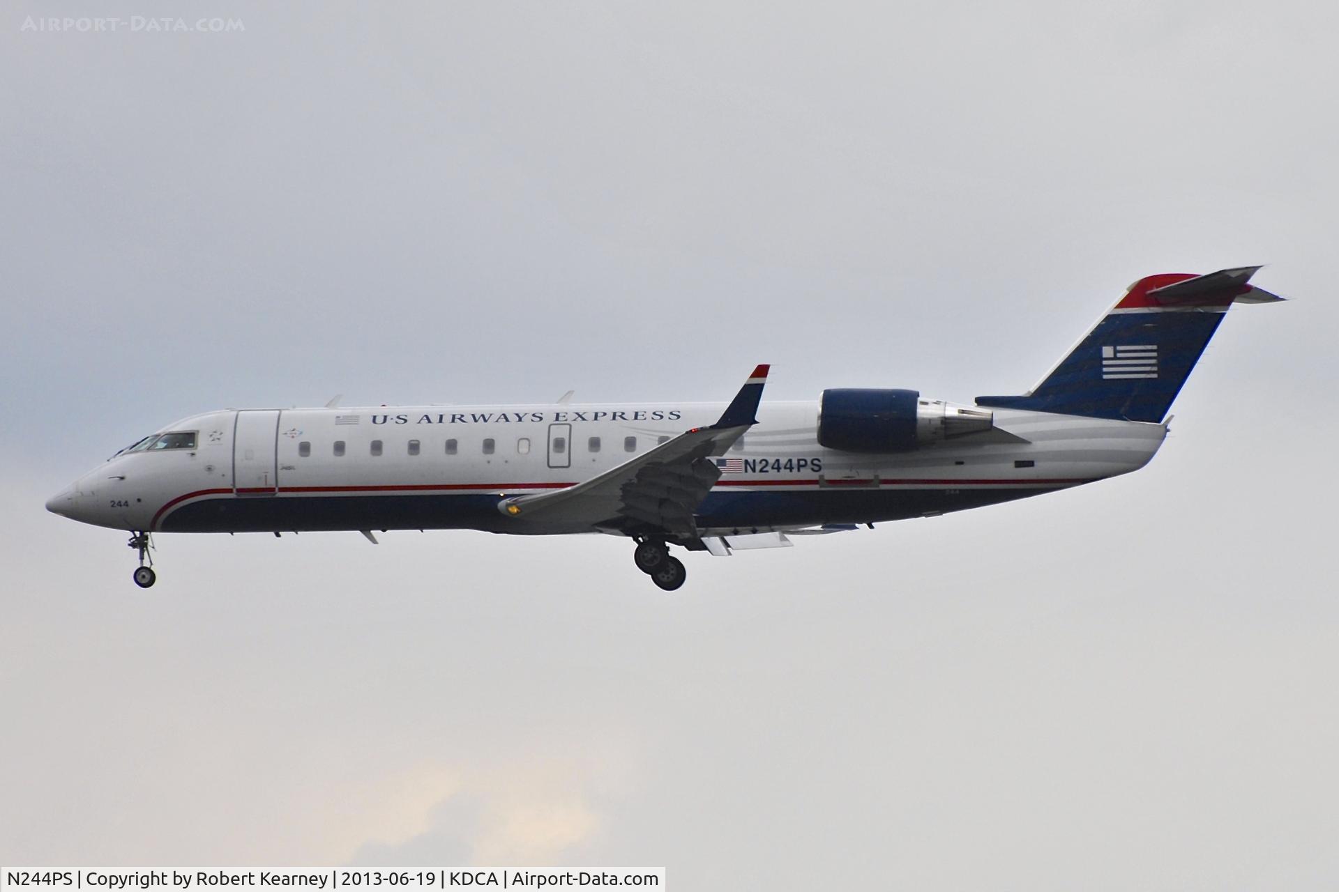 N244PS, 2004 Bombardier CRJ-200ER (CL-600-2B19) C/N 7912, On short finals for r/w 1