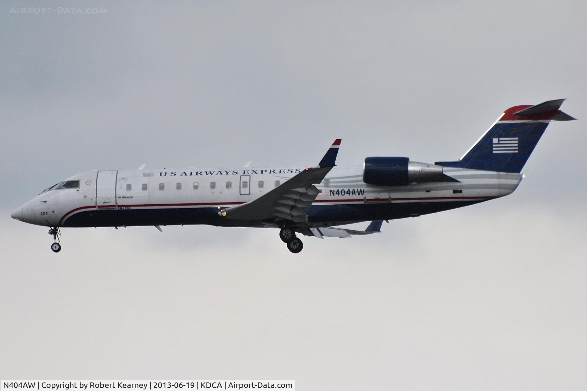 N404AW, 1999 Canadair CRJ-200LR (CL-600-2B19) C/N 7294, On short finals for r/w 1