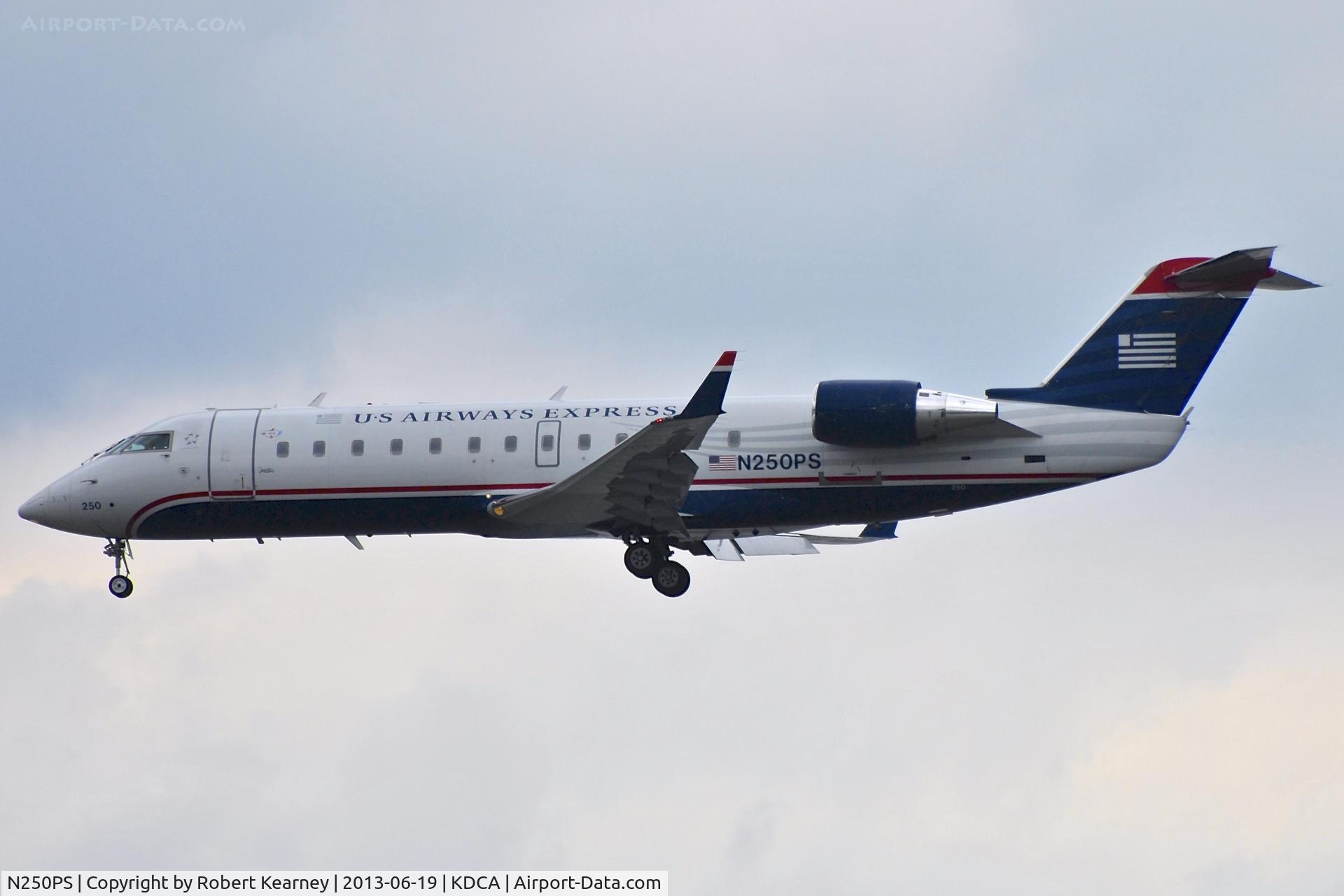 N250PS, 2004 Bombardier CRJ-200ER (CL-600-2B19) C/N 7929, On short finals for r/w 1