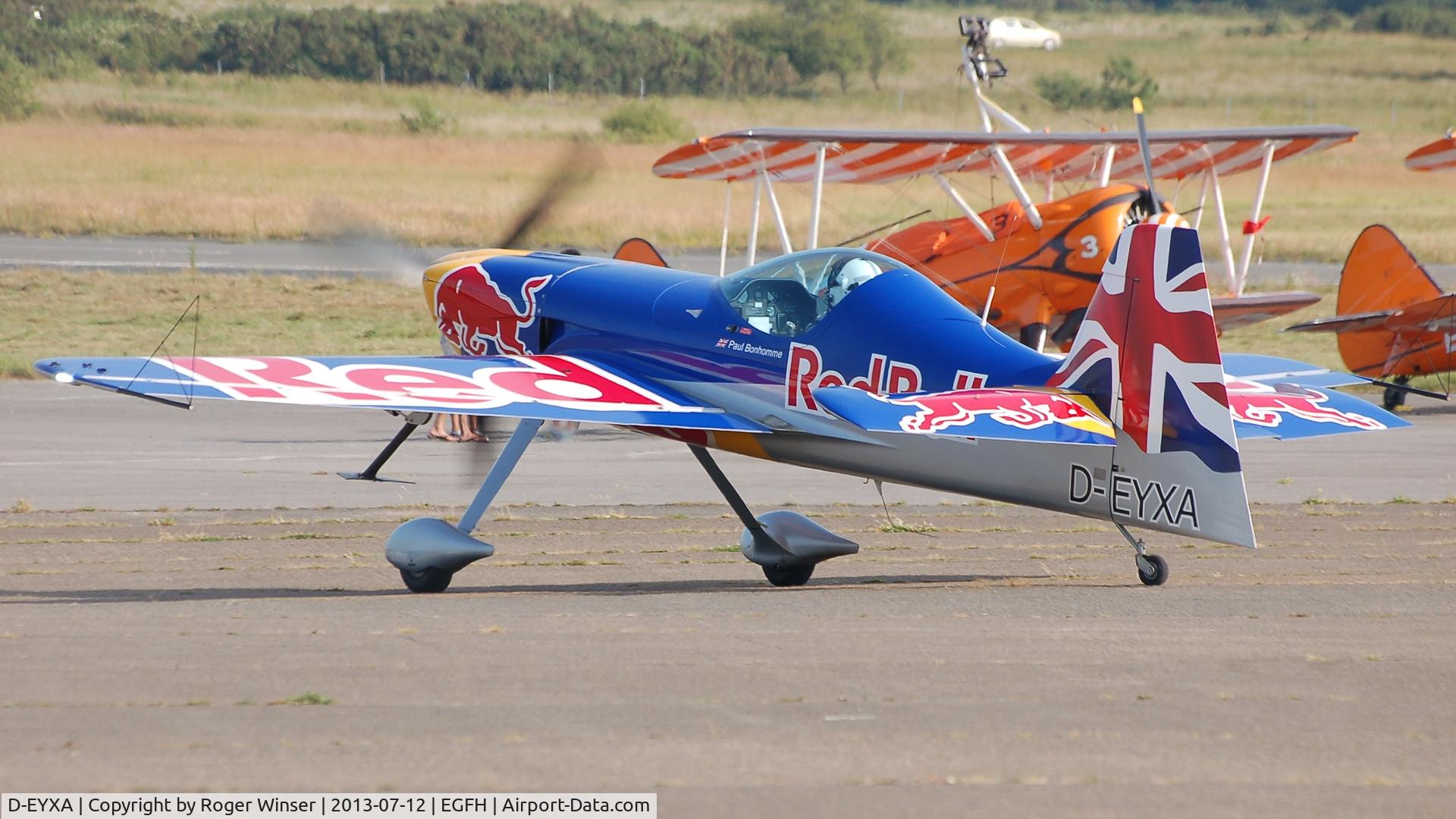 D-EYXA, 2011 XtremeAir XA-41 Sbach 300 C/N 002, One of the Red Bull Matadors aerobatic duo operating from Swansea Airport for the duration of the Wales National Air Show, Swansea Bay.