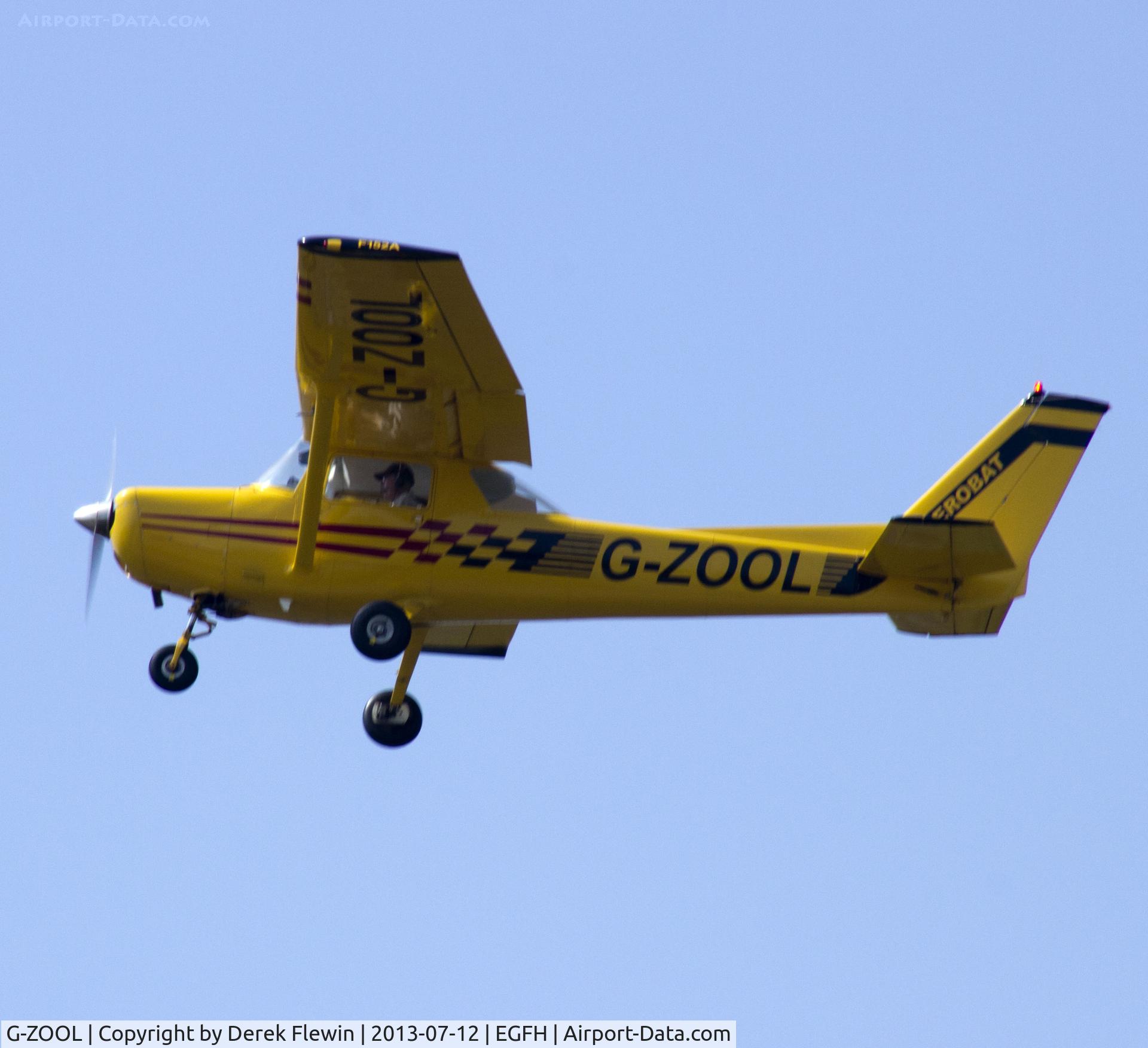 G-ZOOL, 1979 Reims Cessna FA152 C/N 0357, Visiting Reims FA152 pulling out from runway 22 at EGFH.