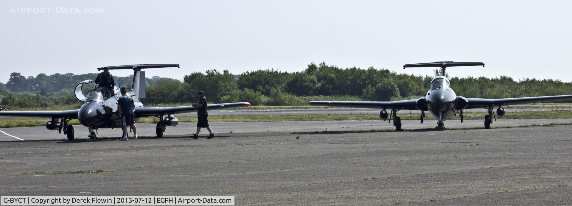G-BYCT, 1973 Aero L-29 Delfin C/N 395142, Red Star Rebels on stand at EGFH.