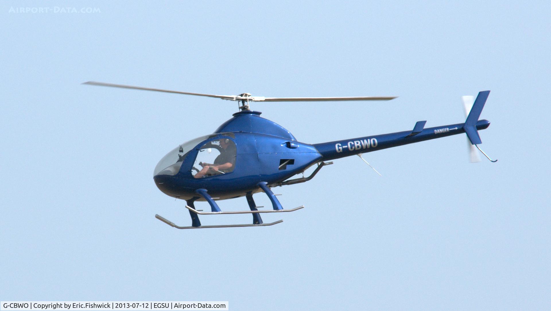 G-CBWO, 2002 Rotorway Exec 162F C/N 6597, 43. G-CBWO departing Duxford Airfield.
