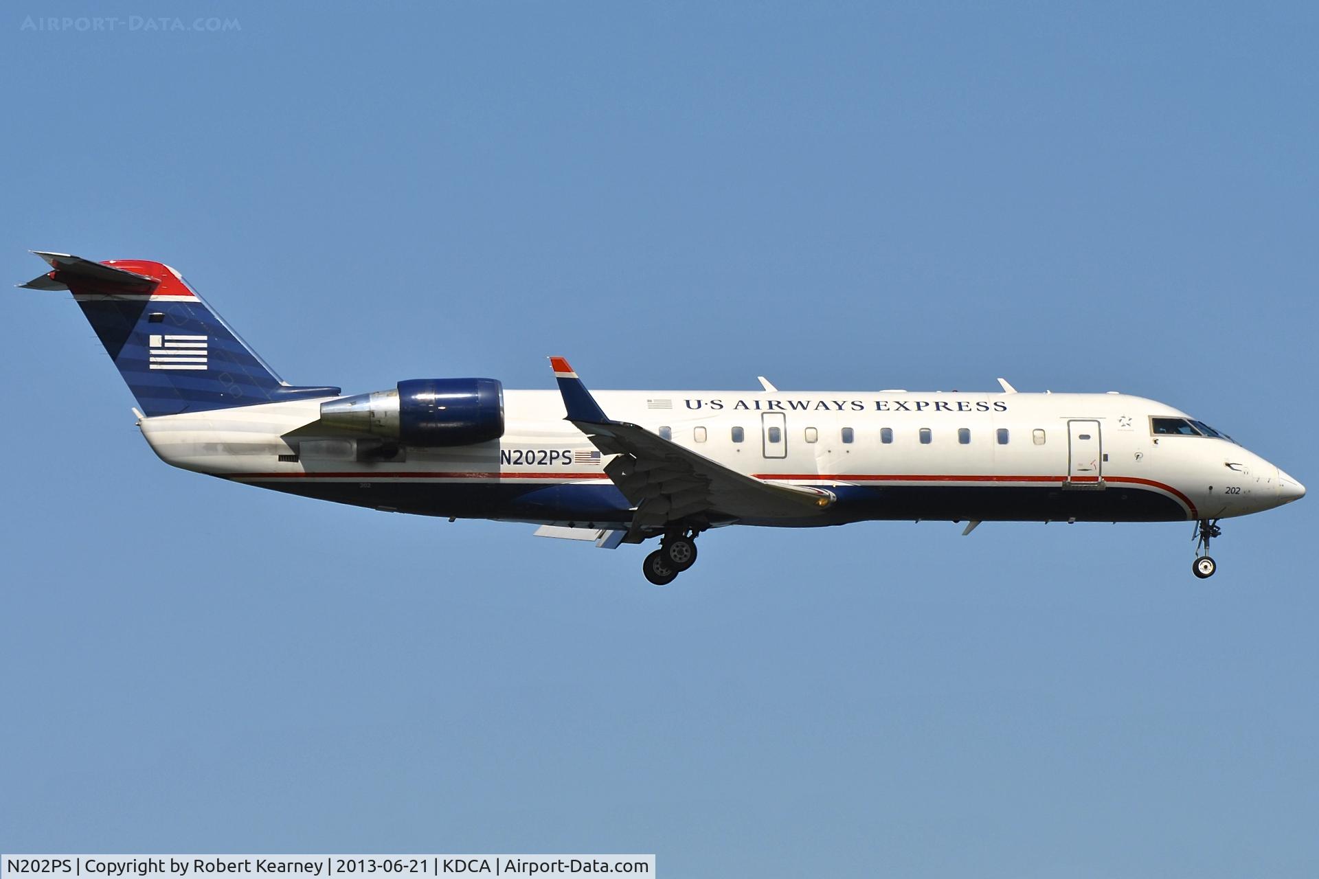 N202PS, 2003 Bombardier CRJ-200ER (CL-600-2B19) C/N 7858, On short finals for r/w 19