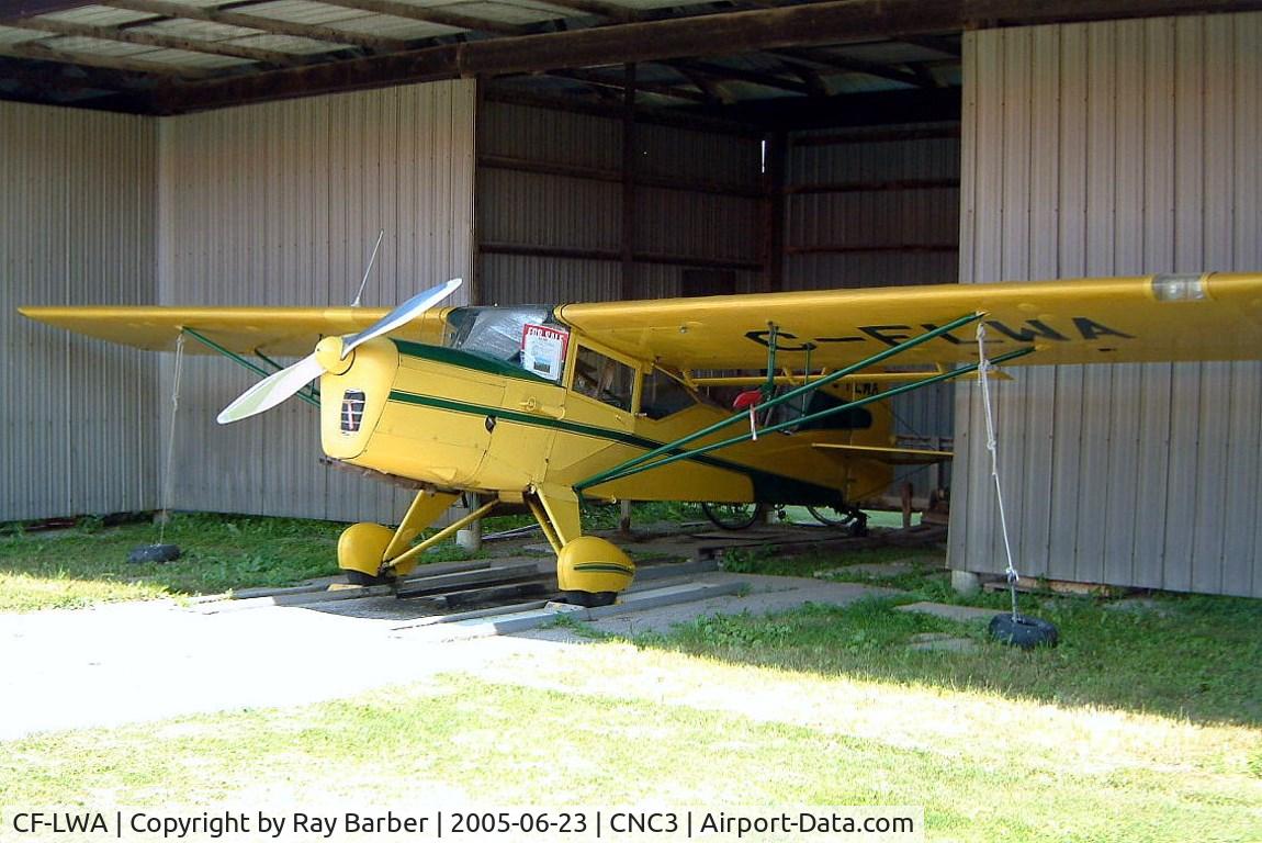 CF-LWA, 1948 Taylorcraft Auster AOP.III C/N TAY297W, Auster AOP.6 [2599] Brampton~C 23/06/2005. Modified by the Brampton Flying Club with a J-1 Autocrat-style rear cabin glazing.