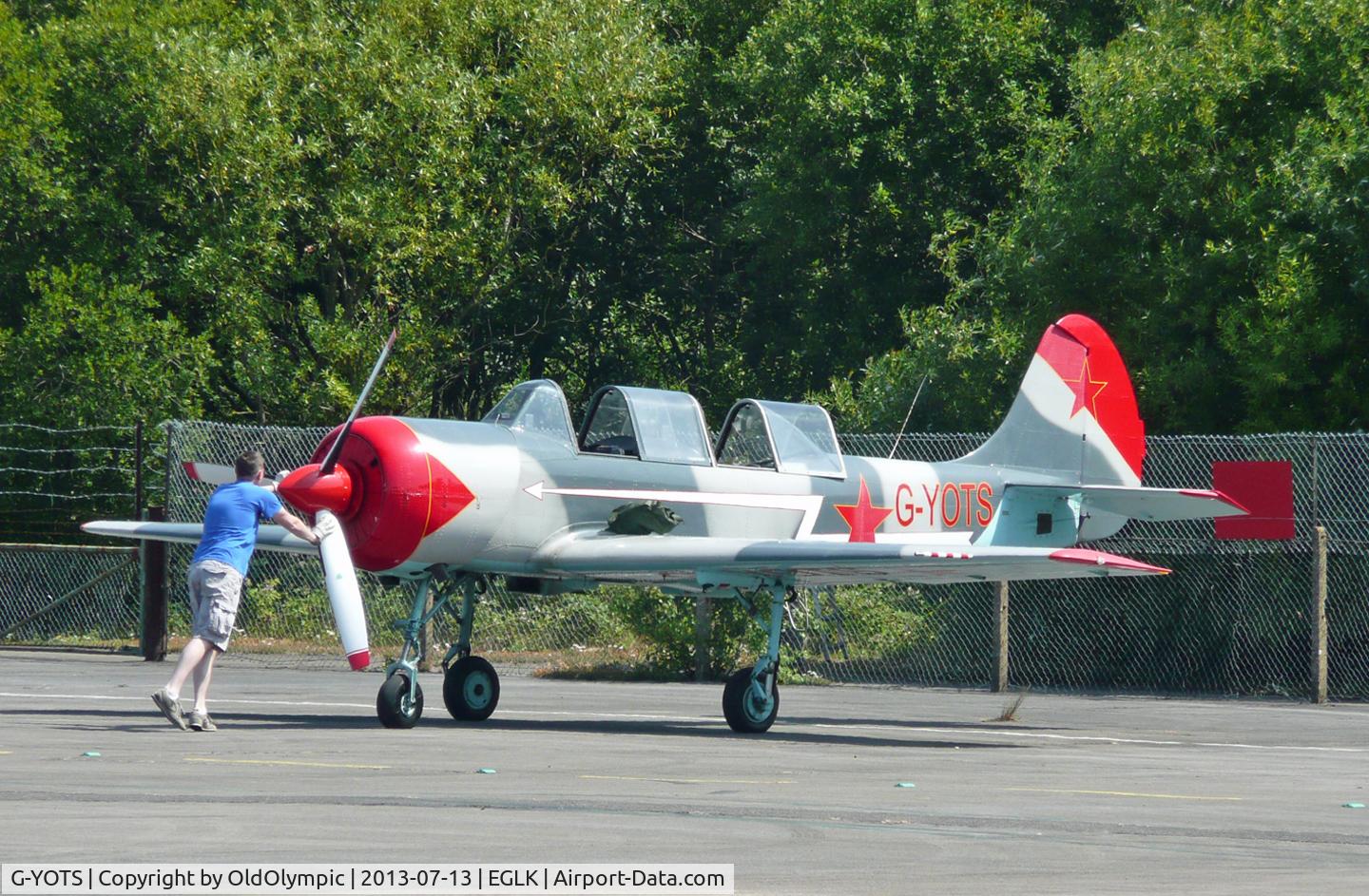 G-YOTS, 1990 Bacau Yak-52 C/N 9010308, Pushing to parking on arrival!