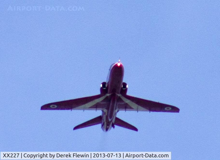 XX227, 1978 Hawker Siddeley Hawk T.1A C/N 063/312063, Red Arrows displaying at the Wales National Air Display Swansea, Red 6 , Flt Lt Lyndon-Smith. (Syncro Leader) Images taken from about a half mile away from the flight line.