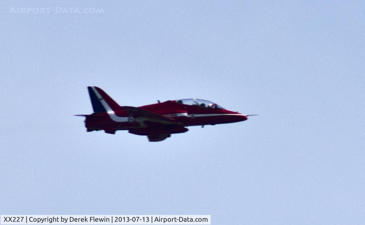 XX227, 1978 Hawker Siddeley Hawk T.1A C/N 063/312063, Red Arrows displaying at the Wales National Air Display Swansea, Red 6 , Flt Lt Lyndon-Smith. (Syncro Leader) Images taken from about a half mile away from the flight line.