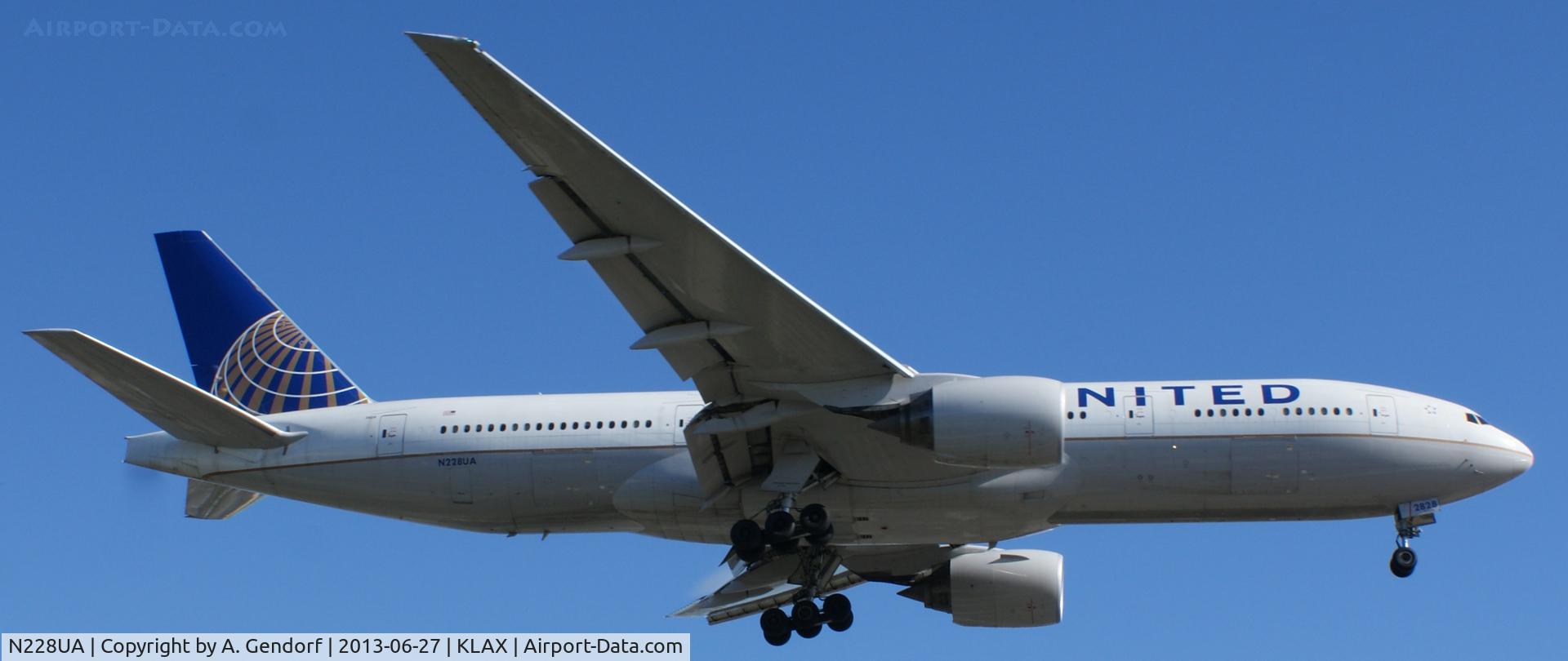 N228UA, 2002 Boeing 777-222 C/N 30556, United, is here arriving at Los Angeles(KLAX), bound from Shanghai Pudong(ZSPD)