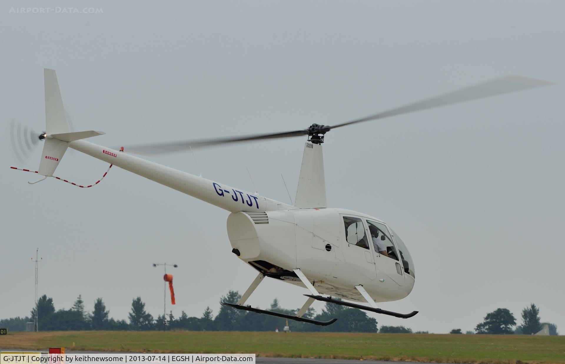 G-JTJT, 2008 Robinson R44  Raven II C/N 1848, Leaving for Goodwood.