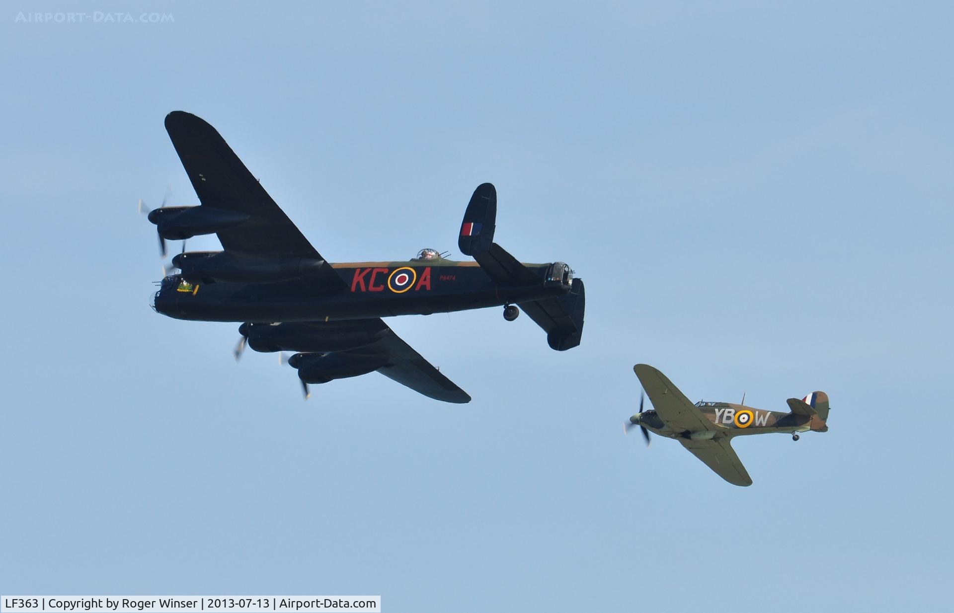 LF363, 1944 Hawker Hurricane IIC C/N 41H/469290, Off airport. Five Merlins. BBMF Hurricane II.c coded YB-W displaying with Lancaster B.I PA474 'Thumper III' coded KC-A on the first day of the Wales National Air Show, Swansea Bay, Wales, UK.