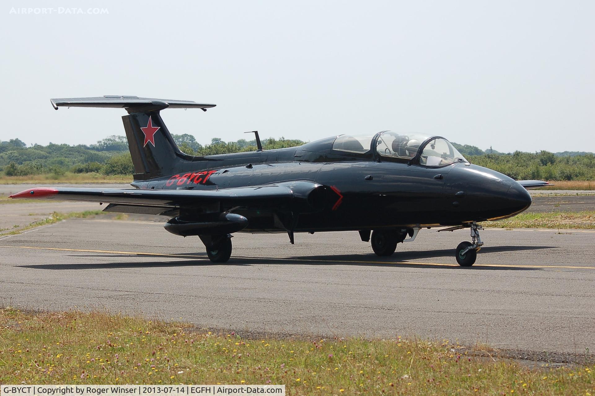 G-BYCT, 1973 Aero L-29 Delfin C/N 395142, Rebel 2 of the Red Star Rebels formation aerobatic team taxying prior to departure and displaying on the second day of the Wales National Air Show, Swansea Bay.