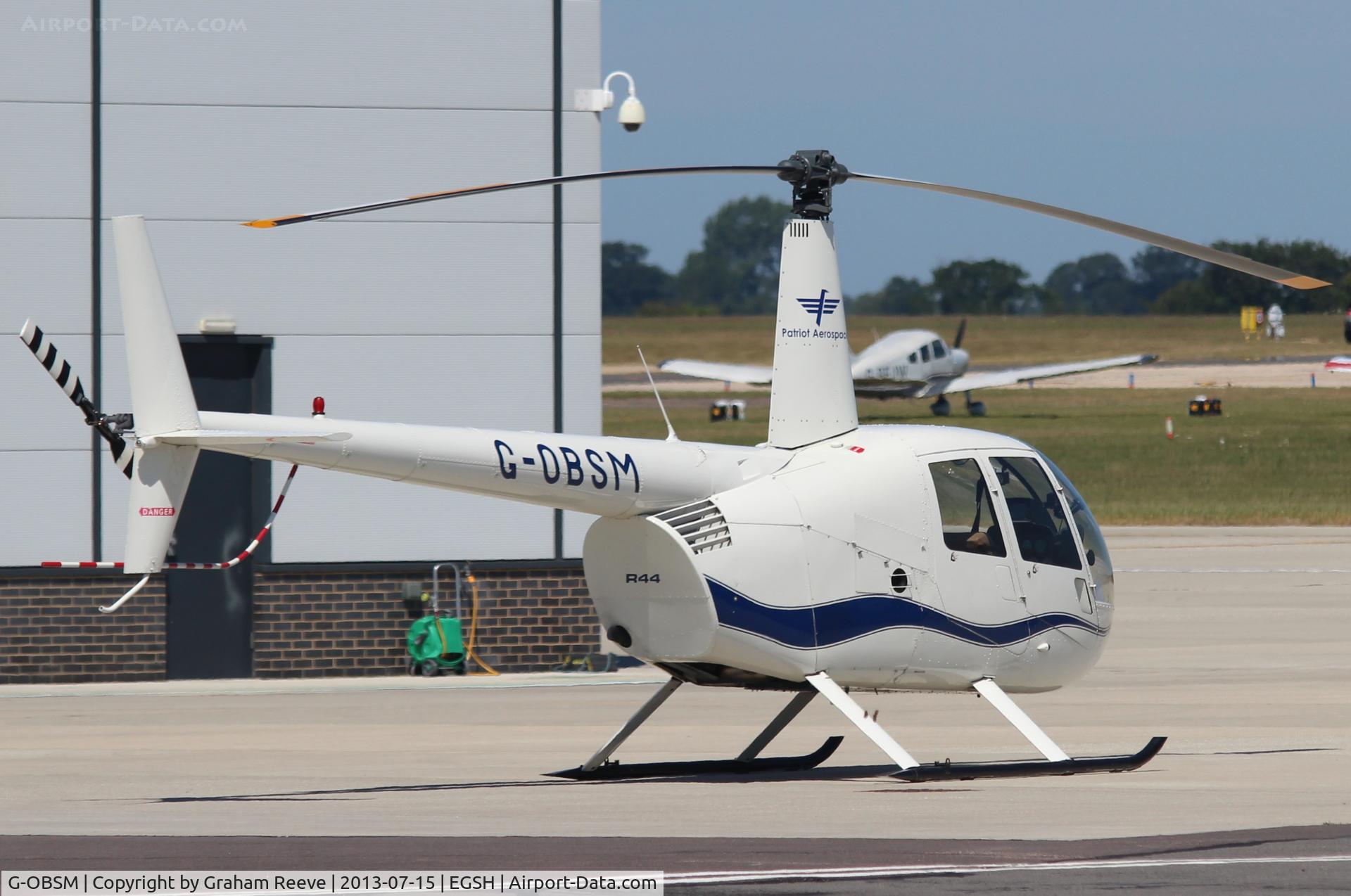 G-OBSM, 2001 Robinson R44 Raven C/N 1030, Parked at Norwich.