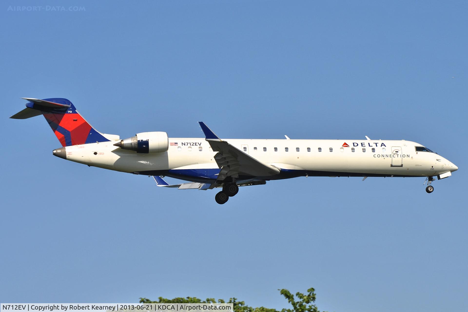 N712EV, 2002 Bombardier CRJ-701ER (CL-600-2C10) Regional Jet C/N 10074, On short finals for r/w 19