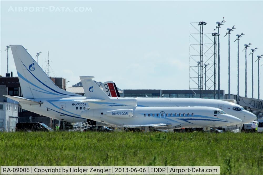 RA-09006, 2006 Dassault Falcon 900EX C/N 164, Apron 1 west - a crowded place this morning......