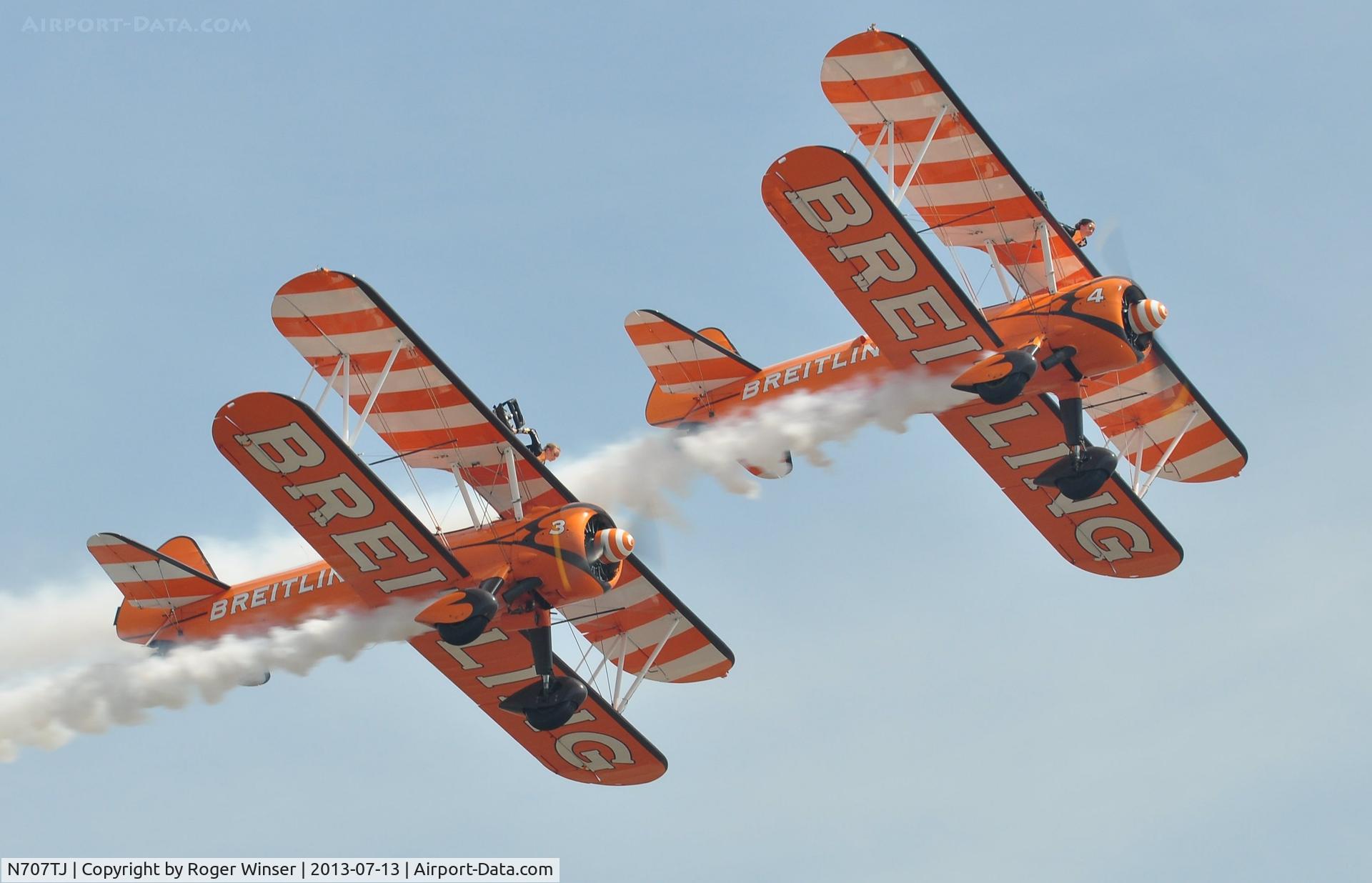 N707TJ, 1943 Boeing A75N1(PT17) C/N 75-950, Off airport. Breitling 4 (N707TJ) leading Breitling 3 (SE-BOG) on the first day of the Wales National Air Show, Swansea Bay, UK. The Boeing Stearman Kaydet biplanes are operated by Aerosuperbatics and they put on a superb display.
