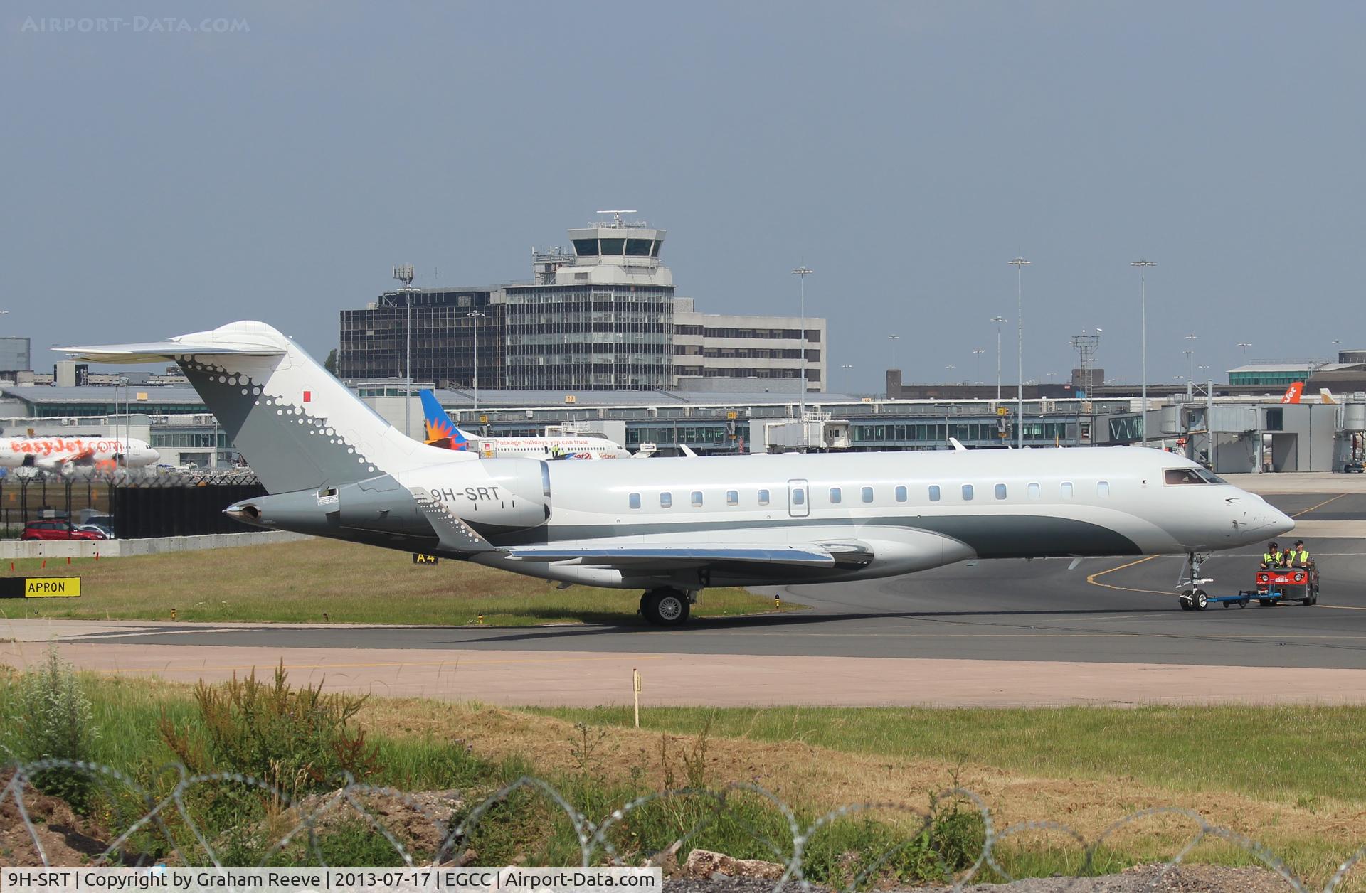 9H-SRT, 2008 Bombardier BD-700-1A10 Global Express C/N 9274, Under tow at Manchester.