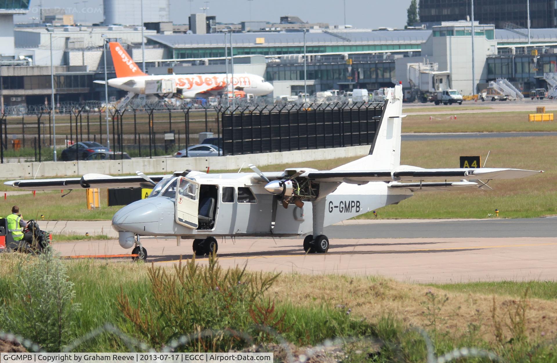G-GMPB, 2002 Pilatus Britten-Norman BN-2T-4S Defender 4000 C/N 4011, Under tow at Manchester.