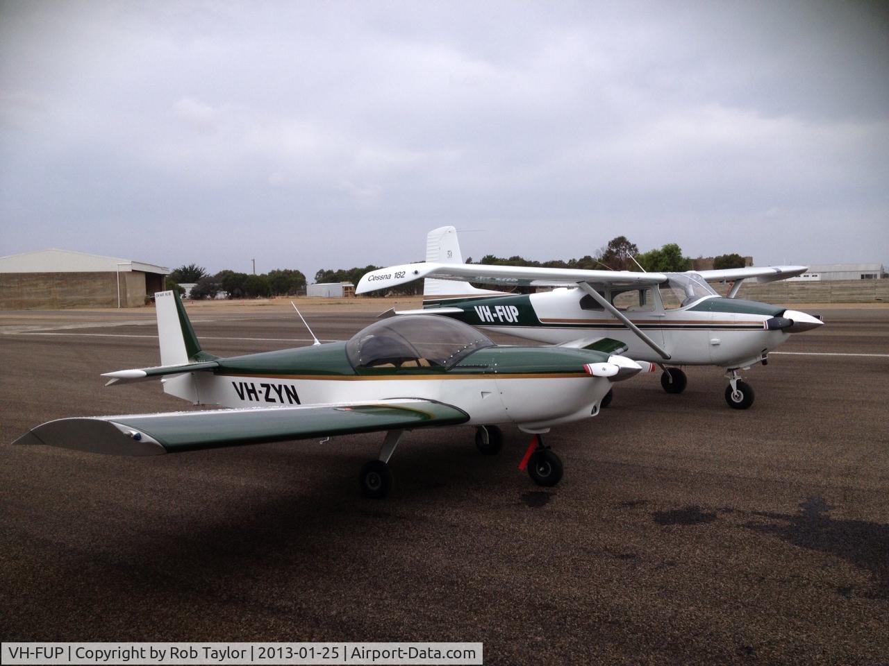 VH-FUP, 1956 Cessna 182 Skylane C/N 33342, VH FUP and VH ZYN. Taken at YBNS Vic Australia