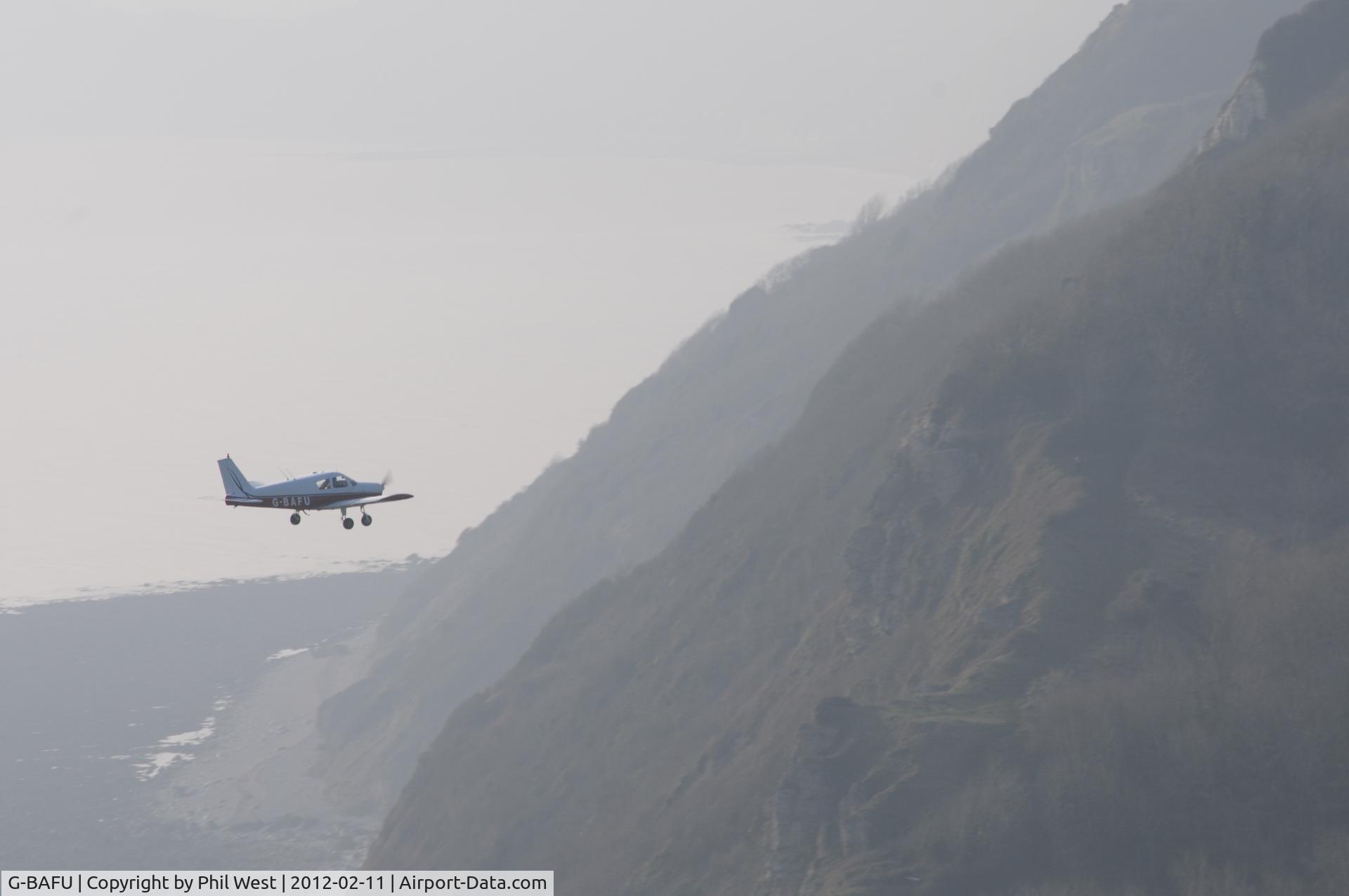 G-BAFU, 1965 Piper PA-28-140 Cherokee C/N 28-20759, Shot from the Cliff top overlooking Branscombe Beach UK