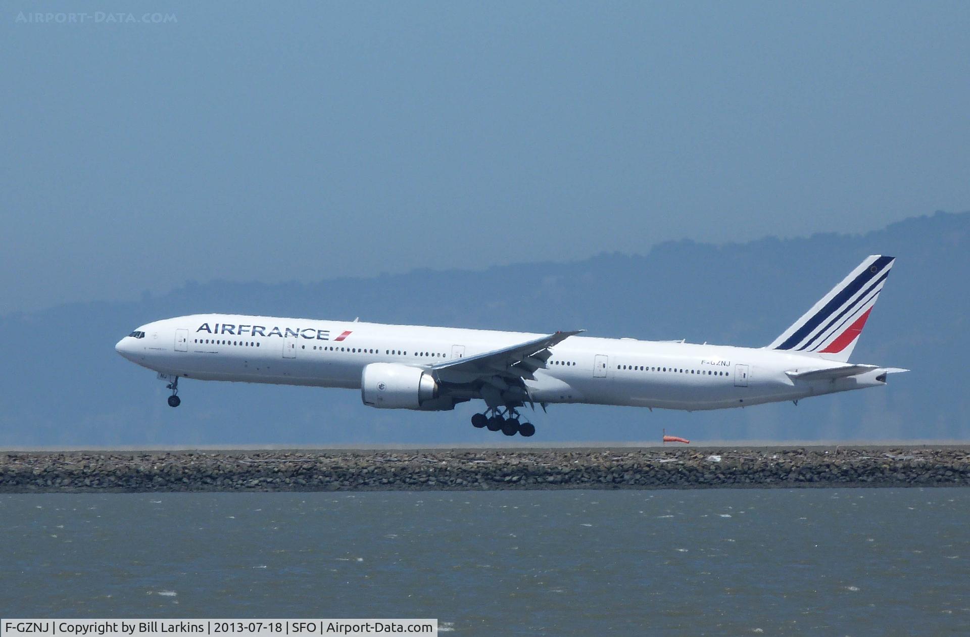 F-GZNJ, 2011 Boeing 777-328/ER C/N 38706, Landing at San Francisco.