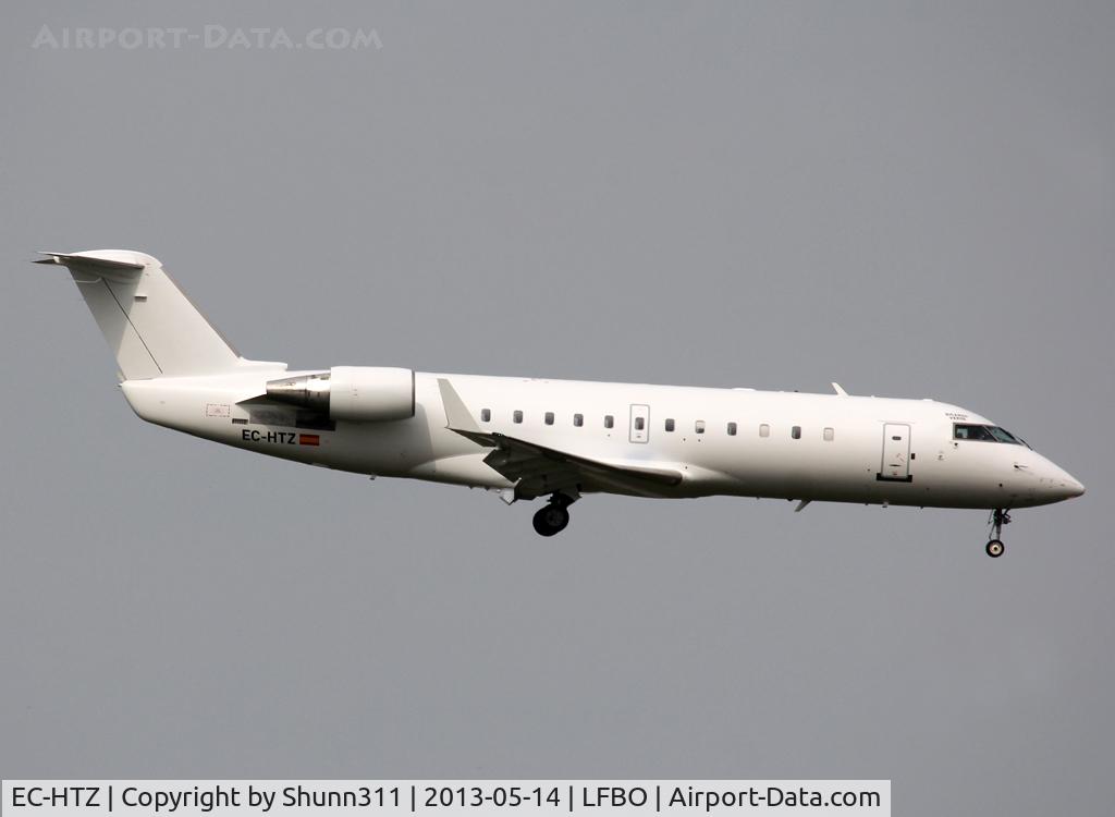 EC-HTZ, 2001 Canadair CRJ-200 (CL-600-2B19) C/N 7493, Landing rwy 14L in all white c/s now...