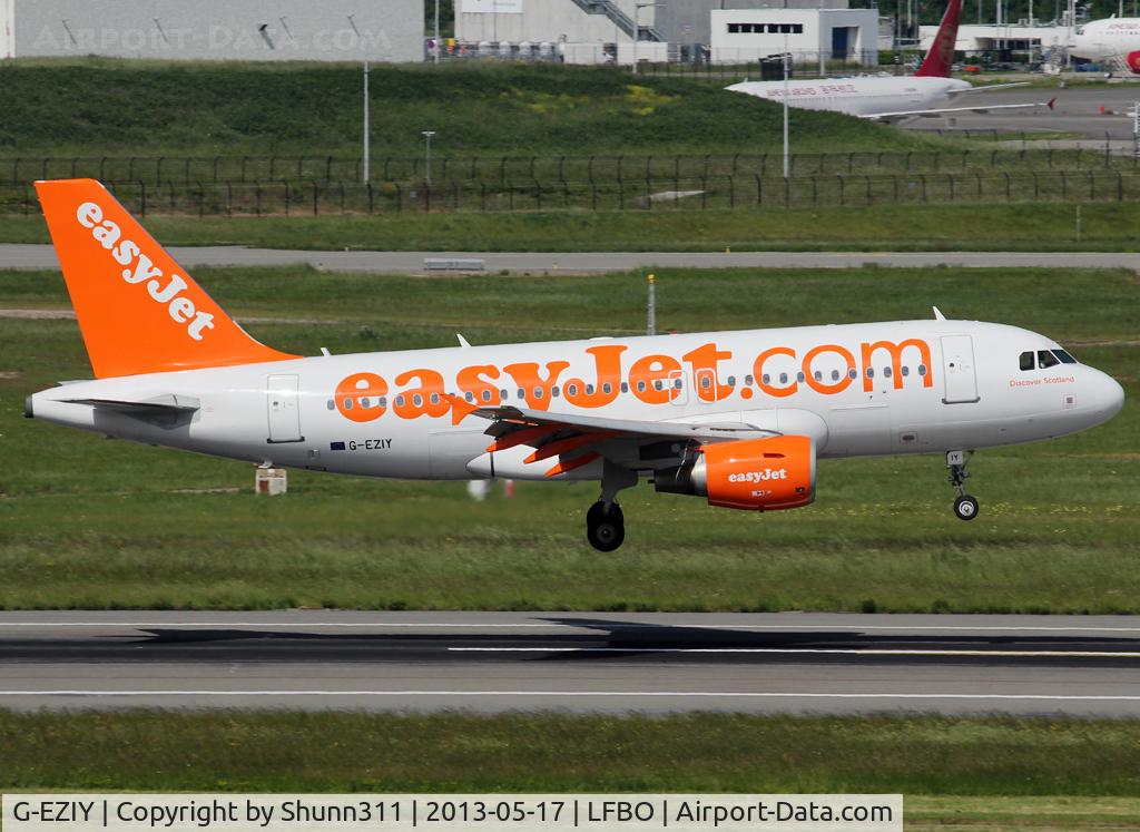G-EZIY, 2005 Airbus A319-111 C/N 2636, Landing rwy 14R without 'Come On, Let's Fly' titles but with additional 'Discover Scotland' titles on cockpit...