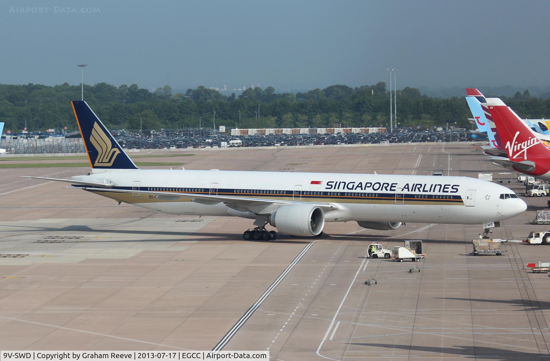 9V-SWD, 2006 Boeing 777-312/ER C/N 34569, About to depart.