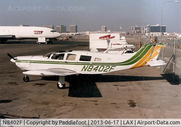 N8402F, Piper PA-32R-300 Cherokee Lance C/N 32R7780096, Took this in early 80's at LAX on the South side (cargo complex).
Don't remember the incident but aircraft suffered a ground collision of some kind.