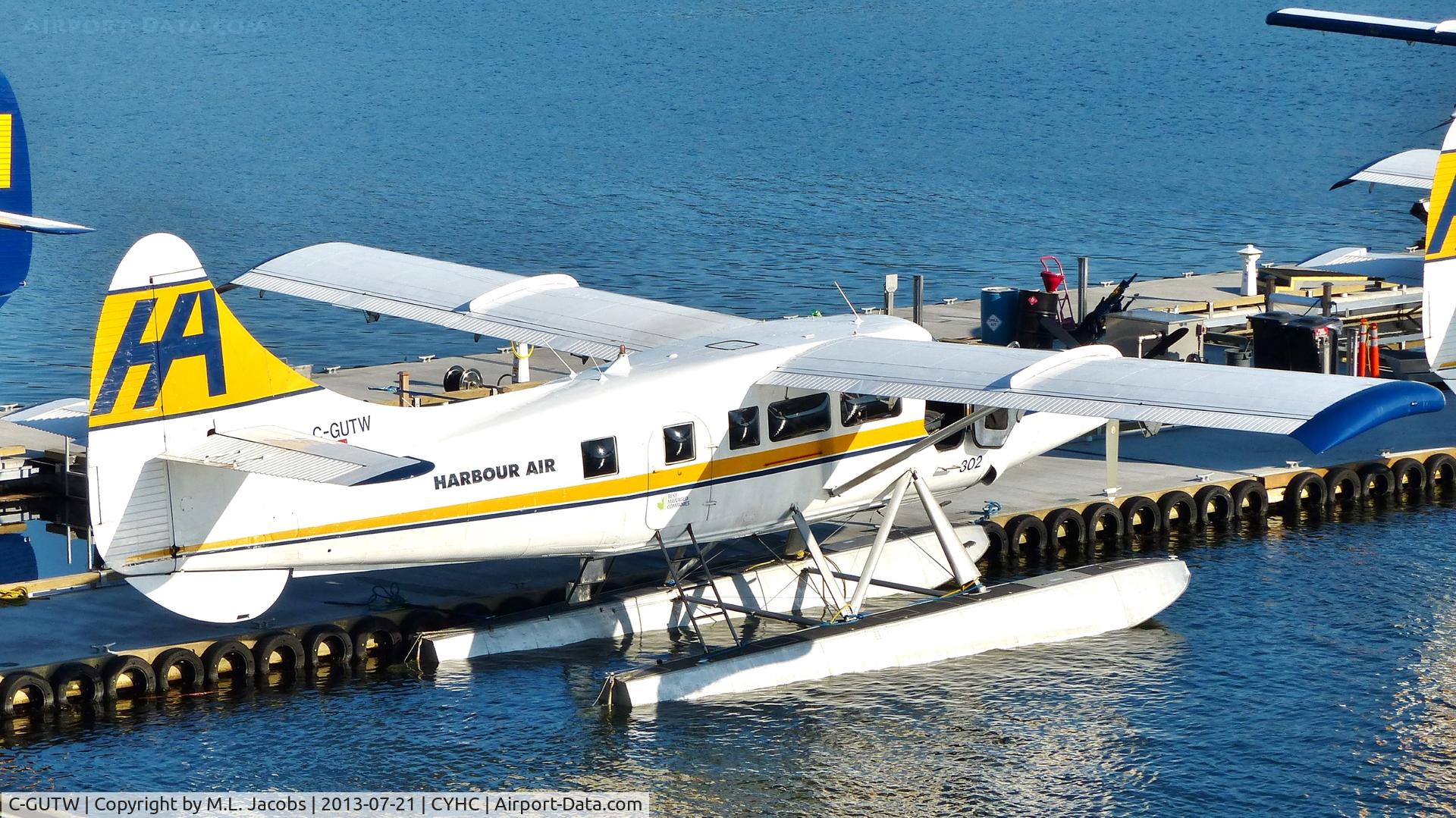 C-GUTW, 1960 De Havilland Canada DHC-3 Turbo Otter Otter C/N 405, Harbour Air #302 at terminal in Coal Harbour.