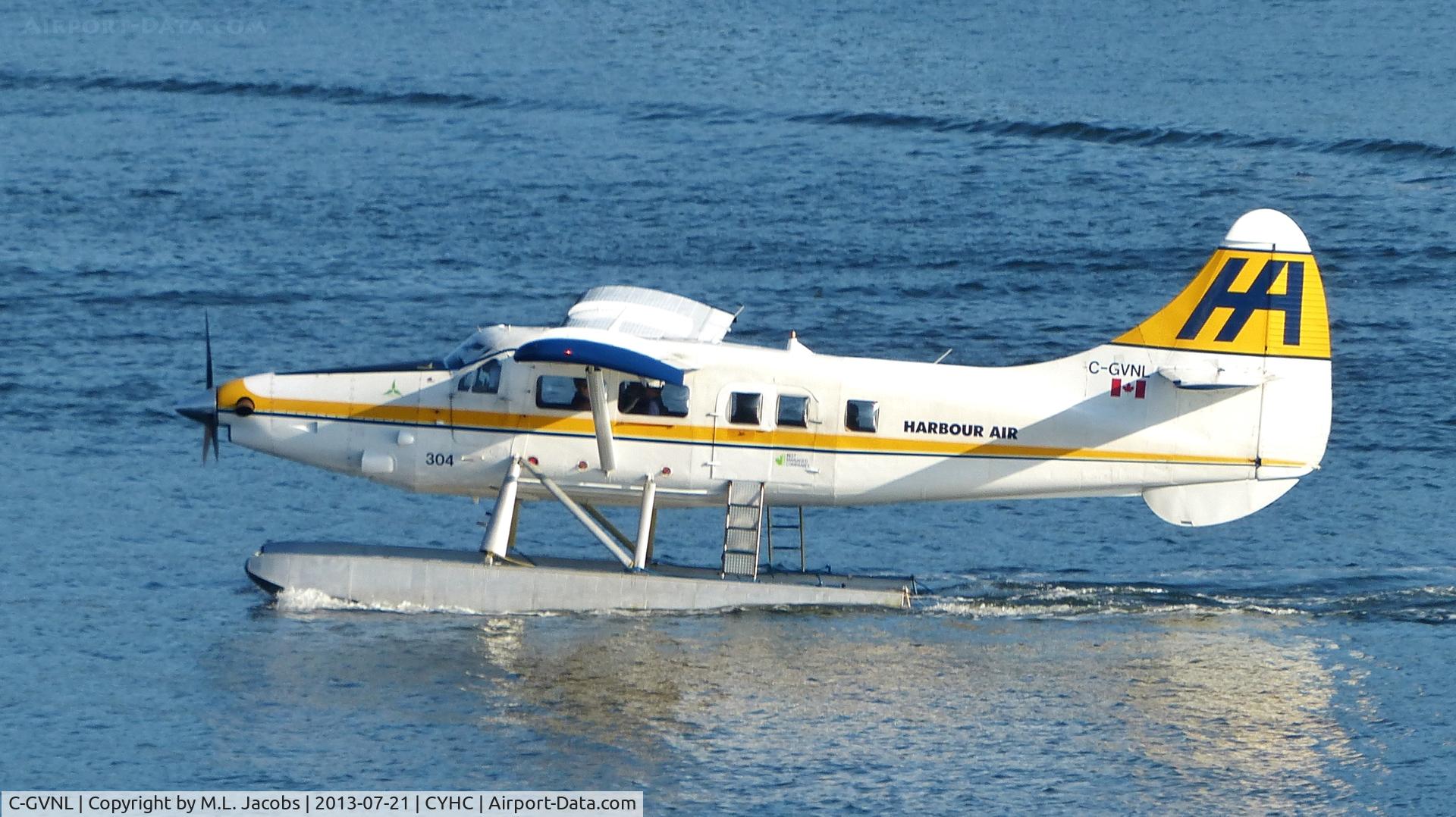 C-GVNL, 1956 De Havilland Canada DHC-3 Otter C/N 105, Harbour Air #304 taxiing to terminal in Coal Harbour.