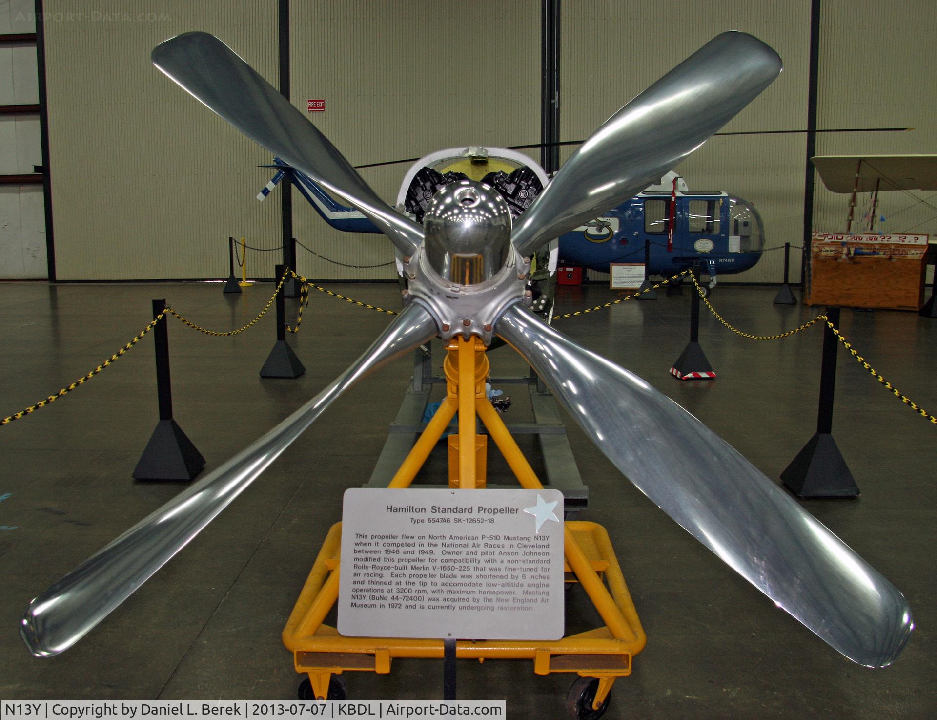 N13Y, 1944 North American P-51D Mustang C/N 122-38859, This aircraft is currently undergoing restoration. The propeller is heavily modified, according to the NEAM placard.