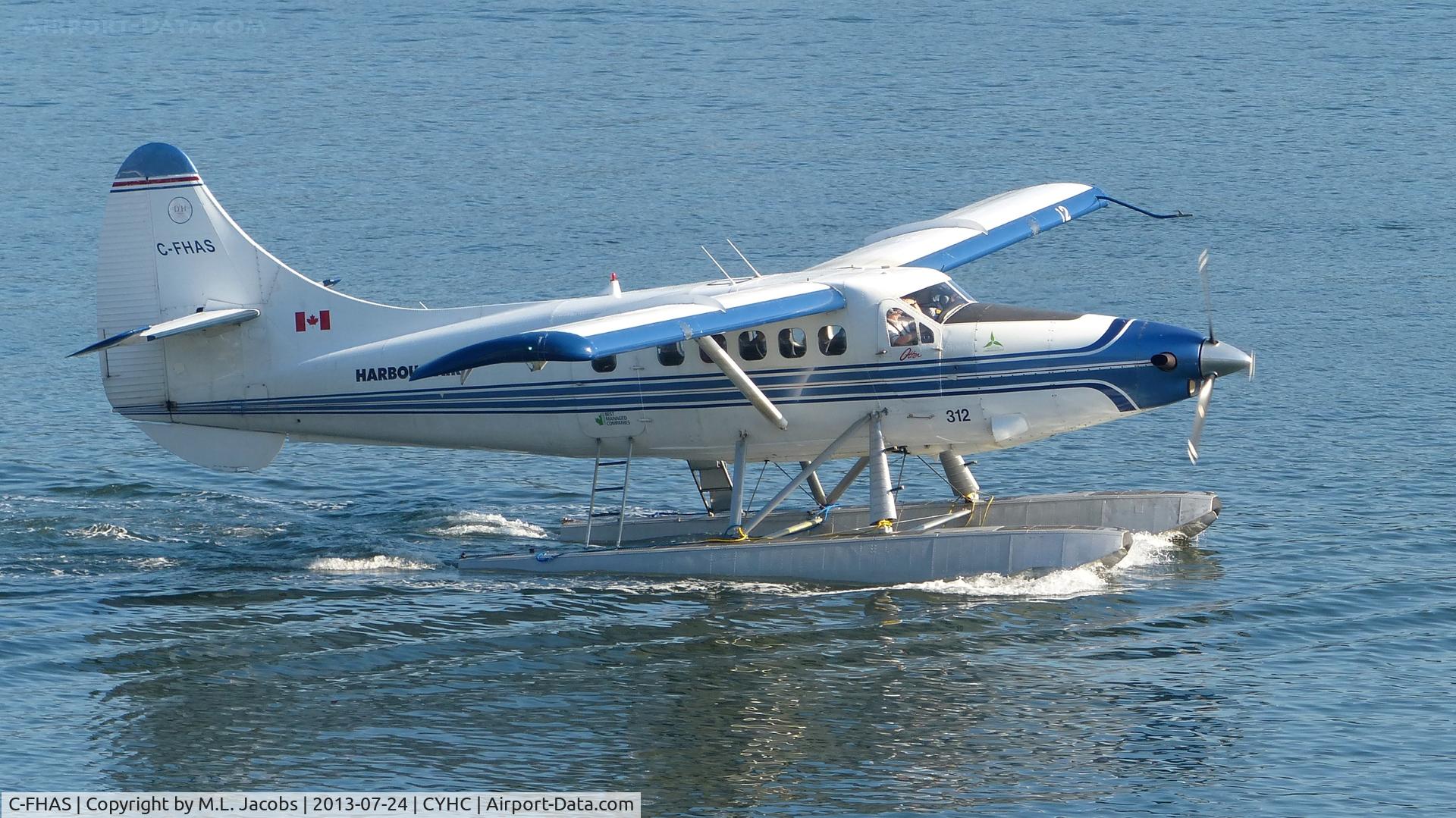 C-FHAS, 1960 De Havilland Canada U-1A  Otter (DHC-3) C/N 382, Harbour Air #312 taxiing in after arrival.