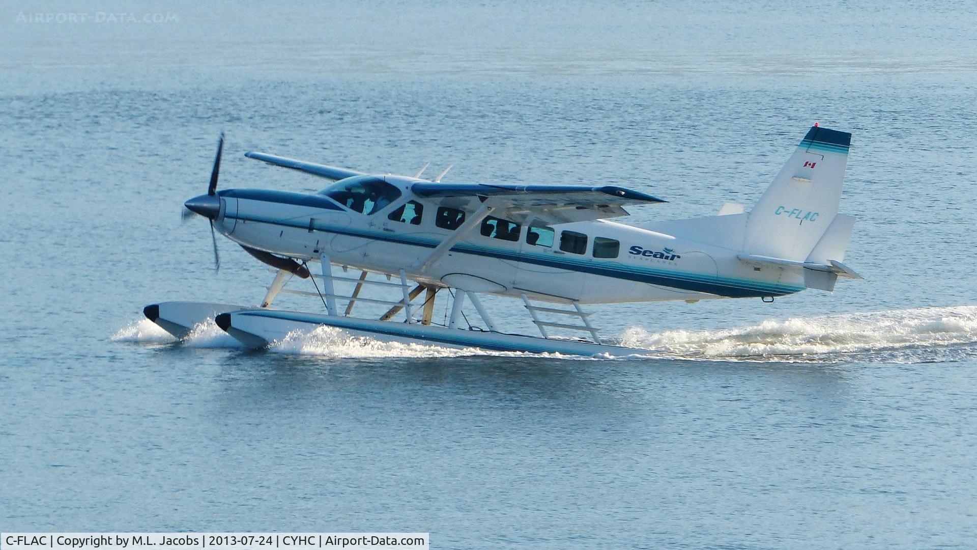 C-FLAC, 2002 Cessna 208 Caravan I C/N 20800357, Seair Seaplanes Cessna flight landing in Coal Harbour.