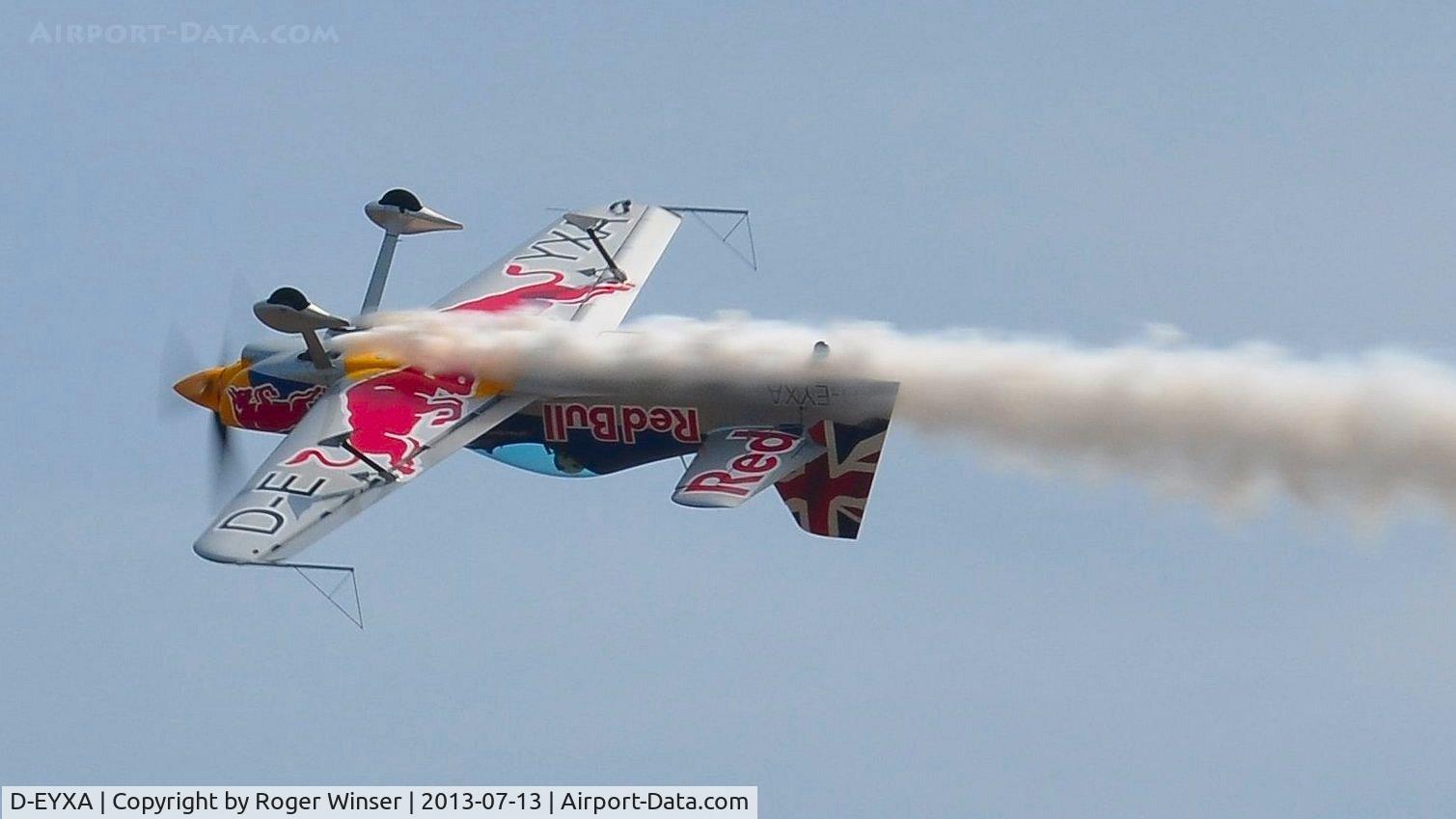 D-EYXA, 2011 XtremeAir XA-41 Sbach 300 C/N 002, Off airport. XA-41 flown by Paul Bonhomme, half of the Red Bulls Matadors duo displaying on he first day of the Wales National Air Show, Swansea Bay, UK.