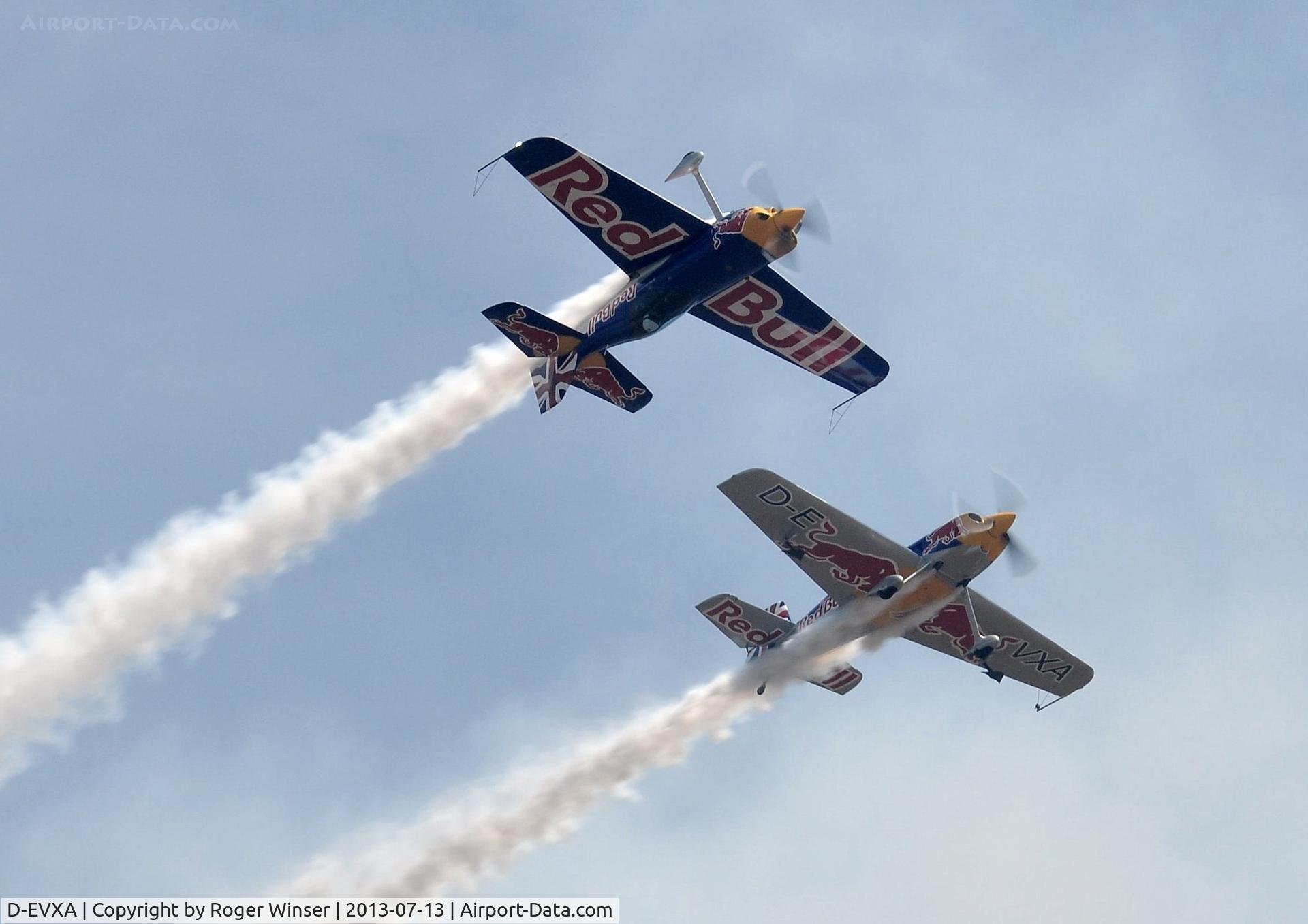D-EVXA, 2010 XtremeAir XA-41 Sbach 300 C/N 01, Off airport. Red Bull Matadors displaying on the first day of the Wales National Air Show, Swansea Bay, UK. D-EVXA flown by Steve Jones formating on D-EYXA flown by Paul Bonhomme. An excellent display.