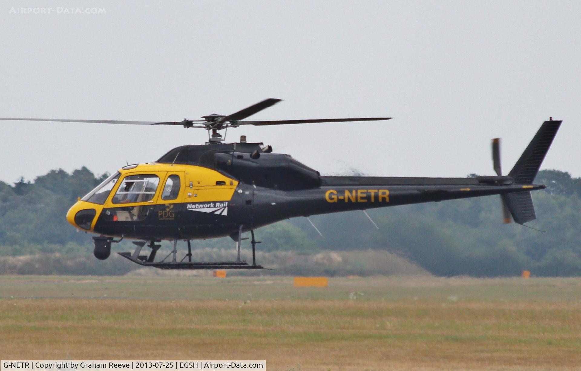 G-NETR, 1982 Aerospatiale AS-355F-1 Ecureuil 2 C/N 5164, Departing from Norwich.