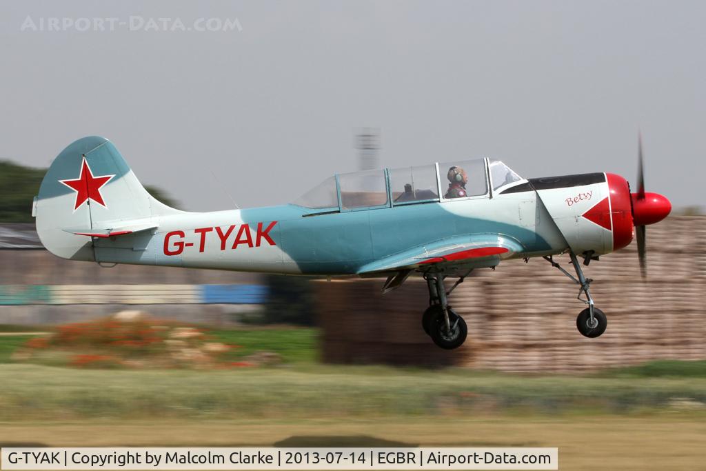 G-TYAK, 1989 Bacau Yak-52 C/N 899907, Bacau Yak-52 at The Real Aeroplane Company's Wings & Wheels Fly-In, Breighton Airfield, July 2013.