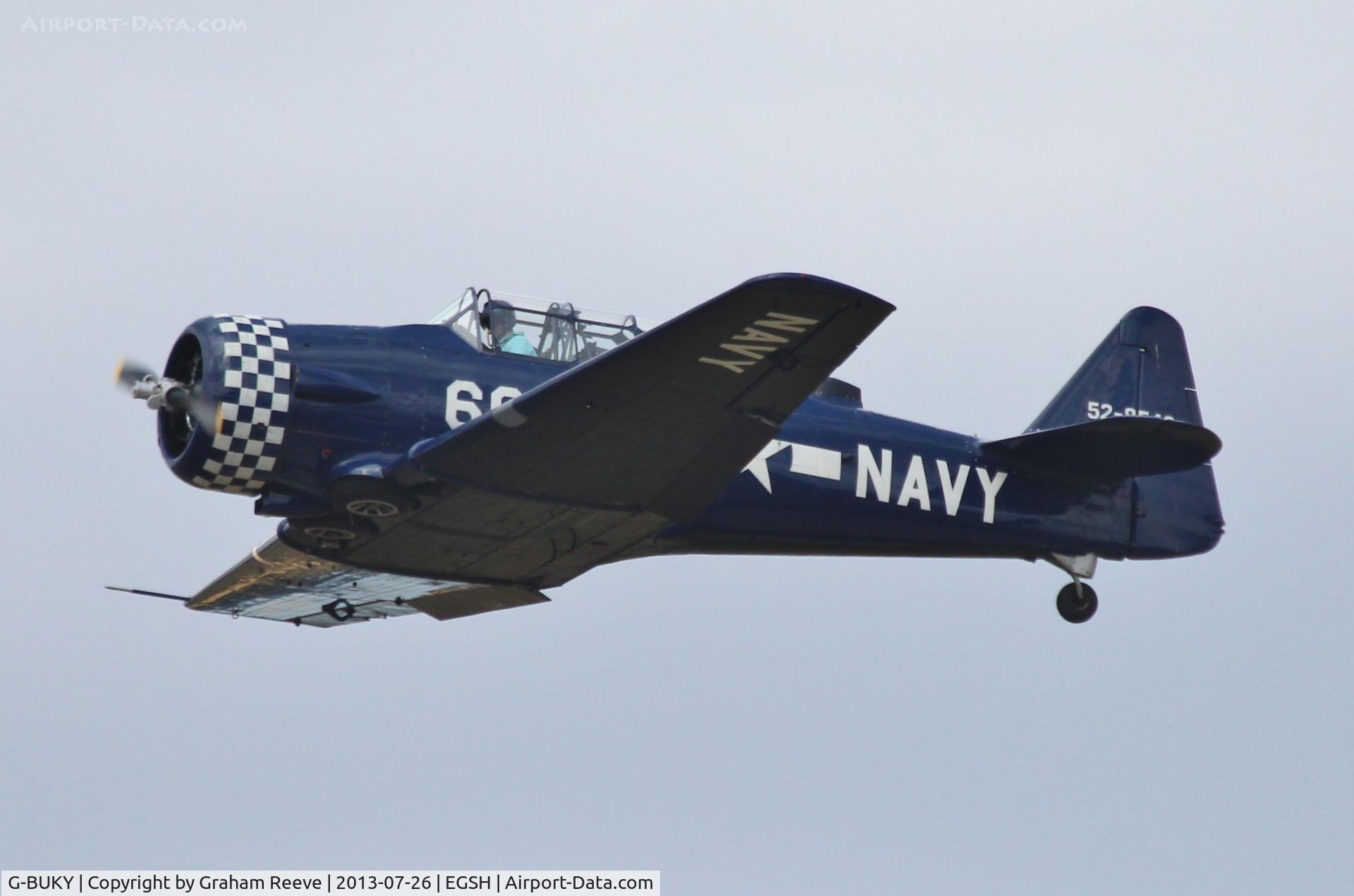 G-BUKY, 1952 Canadian Car & Foundry T-6H Harvard Mk.4M C/N CCF4-464, Just airbourne.